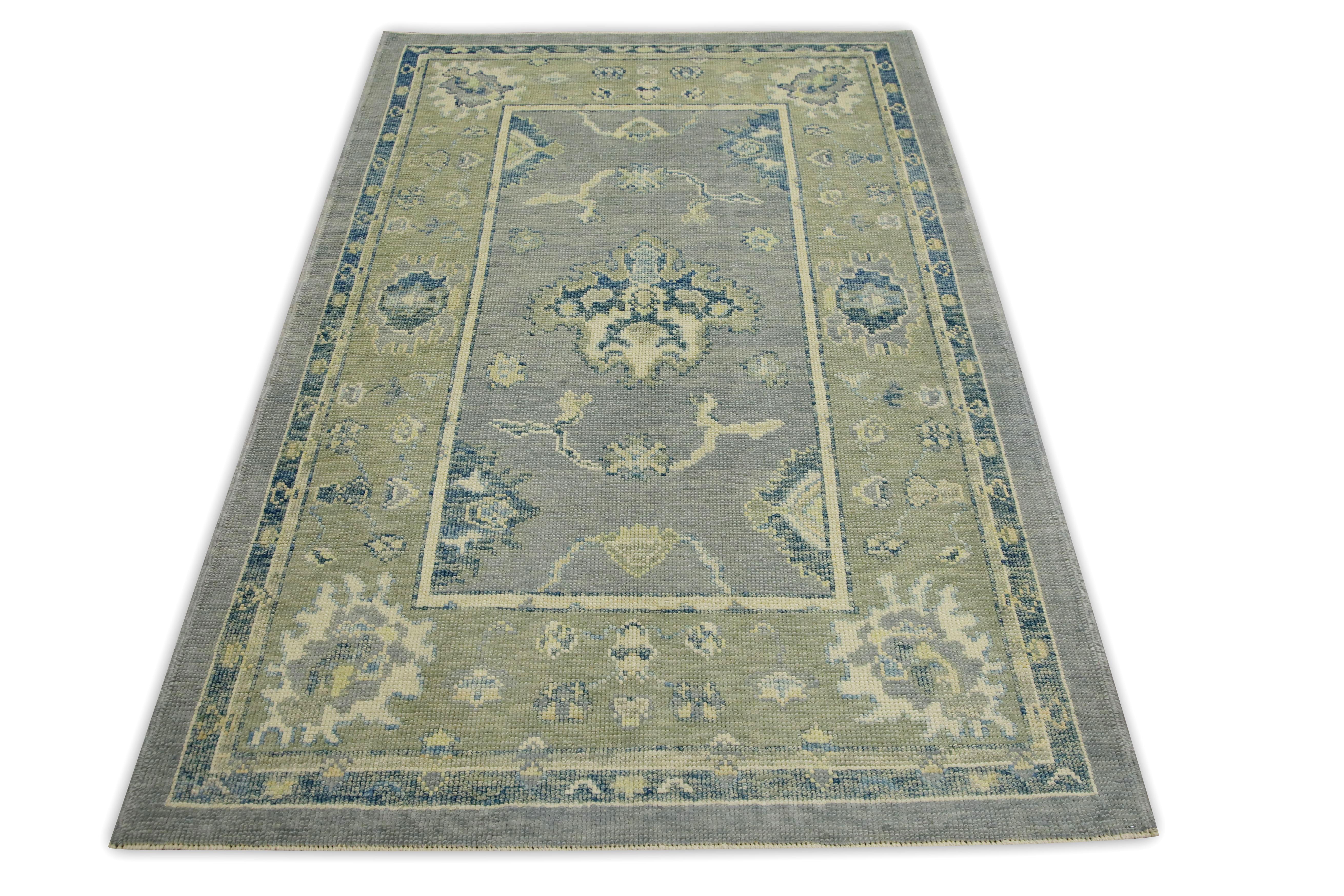 Alfombra turca Oushak de lana tejida a mano con diseño floral verde y azul 4'1