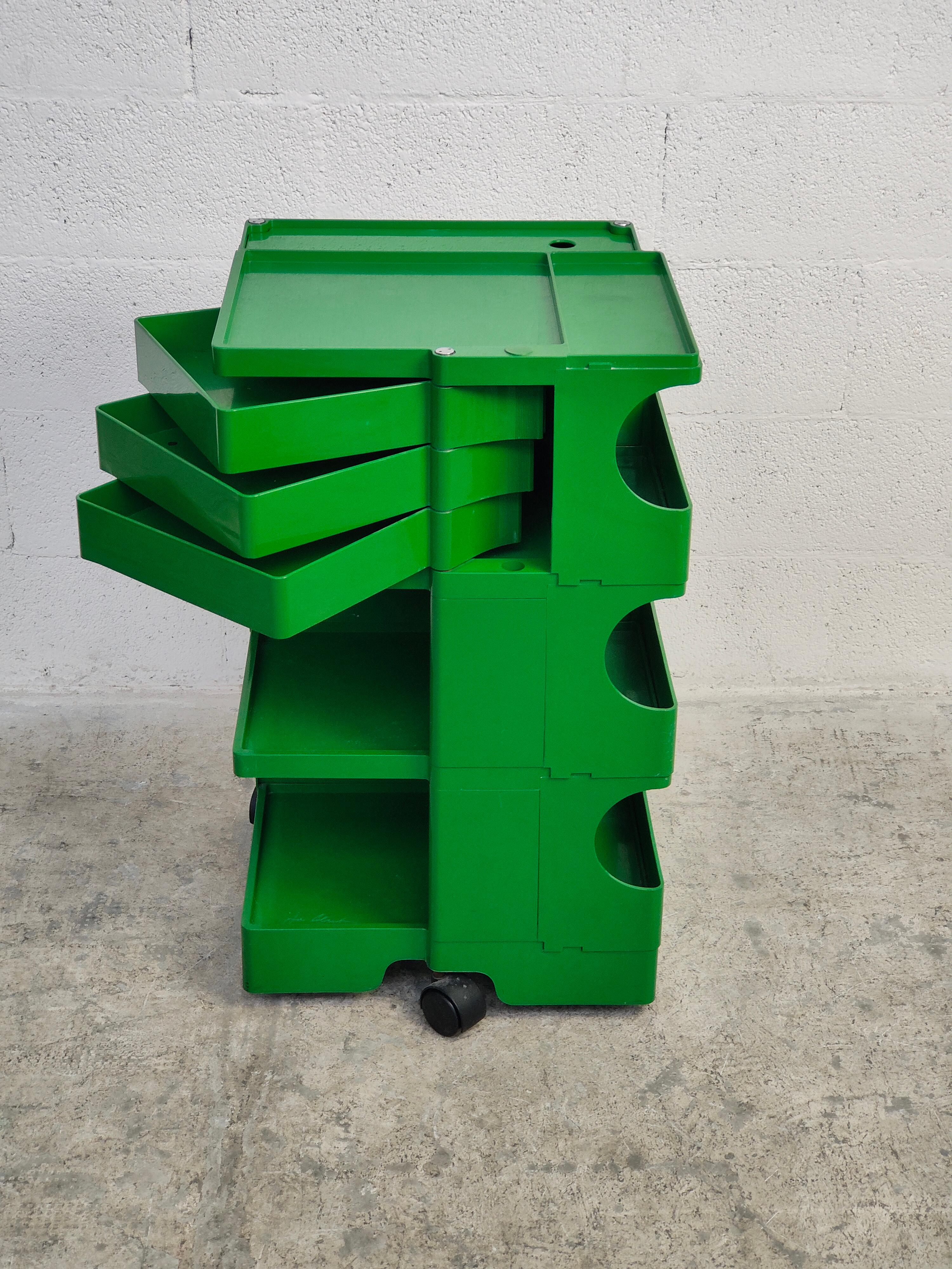 Iconic Boby cart in very rare green color designed by Joe Colombo and produced by Bieffeplast 1970s .
This “Boby” trolley or portable storage system was designed by Joe Colombo in 1969. 
A very handy trolley made of ABS plastic. It has many