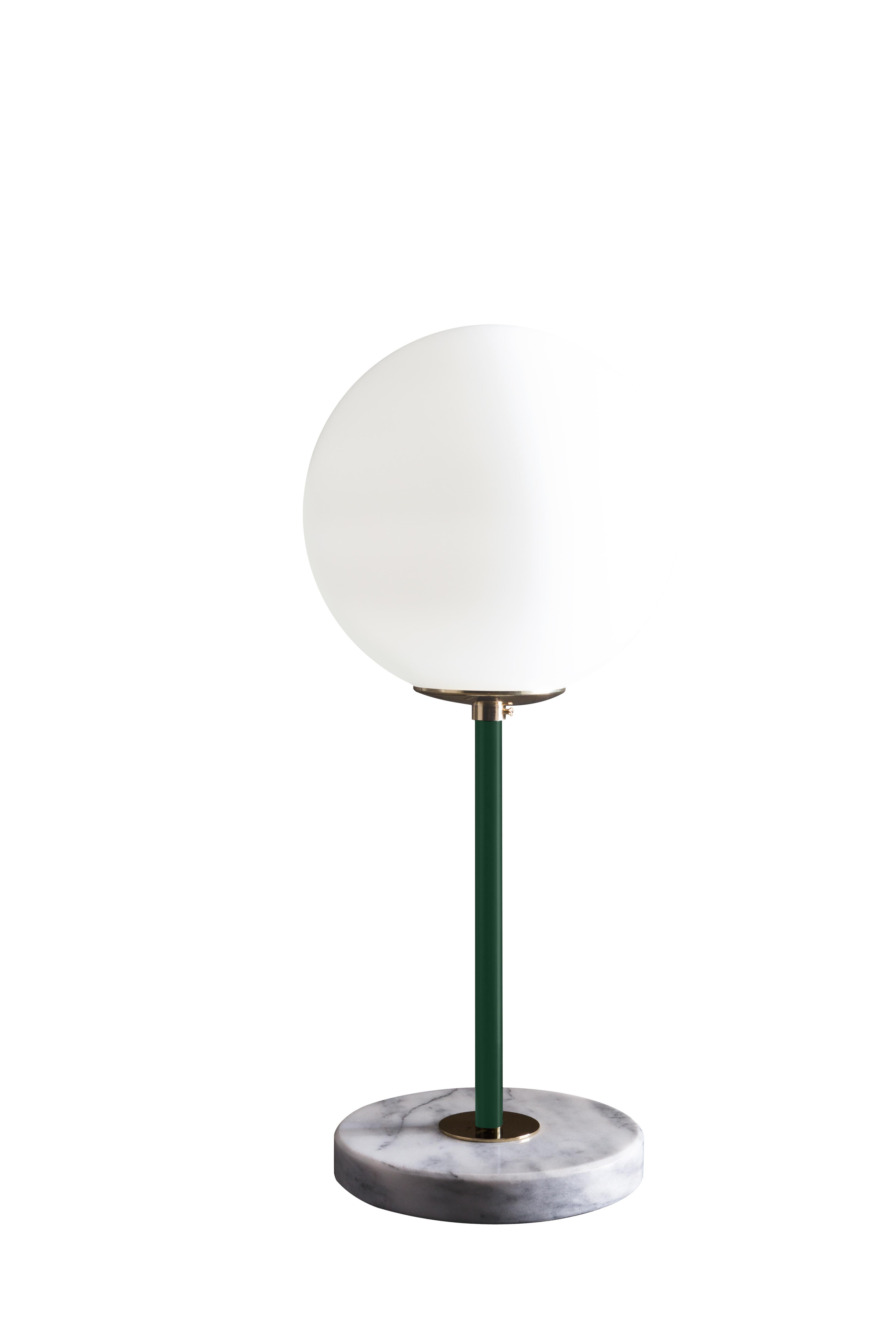 Green brass table lamp 06 by Magic Circus Editions
Dimensions: H 50 x W 22 cm
Materials: Smooth brass, mouth blown glass

Available finishes: Brass, nickel
Available colors (central tube): Black, green pine, red wine, mustard yellow, and