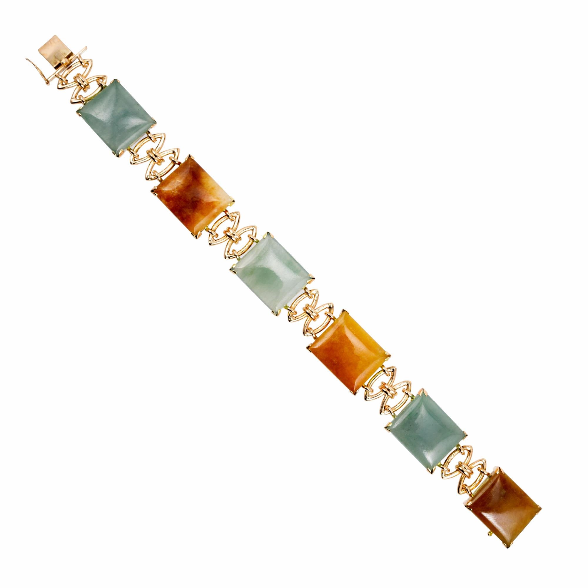 Natural Jadeite Jade bracelet with built in box catch and figure 8 safety. GIA certified with green natural color Jade and brownish orange Jade. 14k yellow gold 

3 rectangular brownish green Jadeite Jade, approx. total weight 21.00cts, translucent,