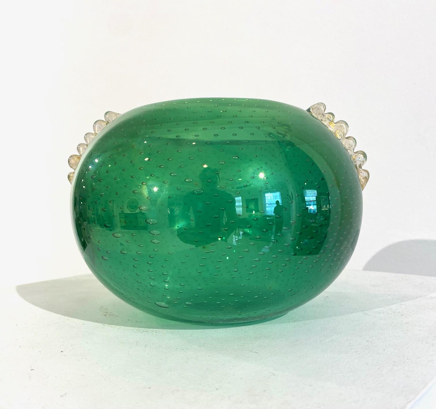 Green bulicante glass vase by Barovier e Toso



					

