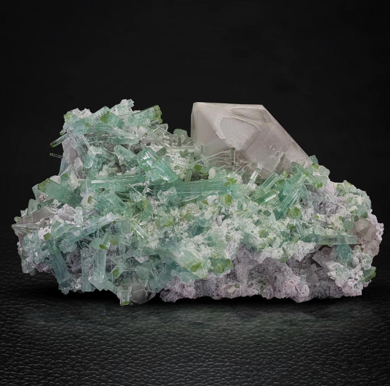 Product Information:

Specimen Name: Tourmaline crystal on Quartz 

Weight: 417 grams

Dimensions: H: 7 x W: 12 x D: 8 cm

Treatment: None

Origin: Dara I Pech, Chapa Dara District, Kunnar Province, Afghanistan 

Description: 

This stunning