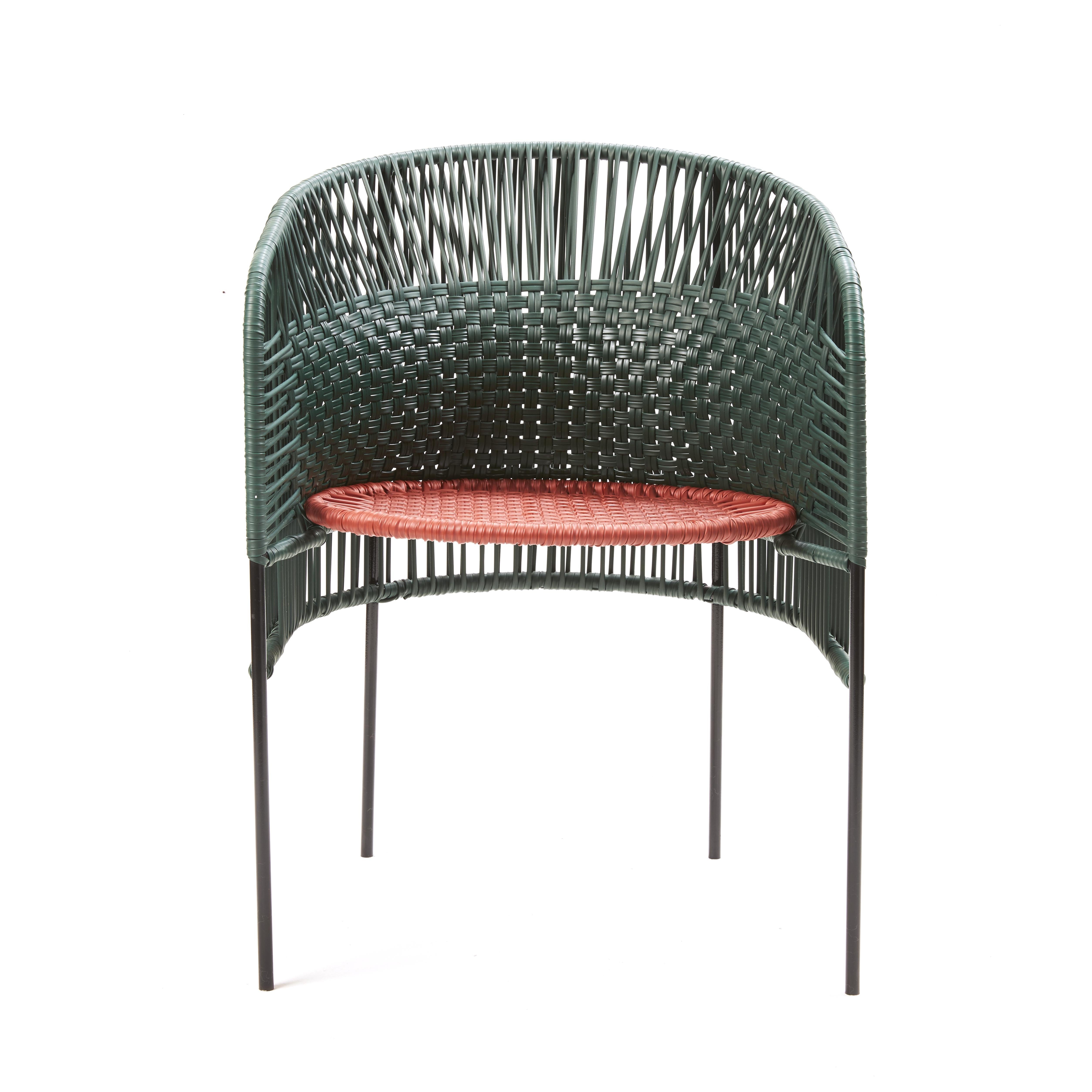Green Caribe chic dining chair by Sebastian Herkner
Materials: Galvanized and powder-coated tubular steel. PVC strings are made from recycled plastic.
Technique: Made from recycled plastic and weaved by local craftspeople in Colombia.
