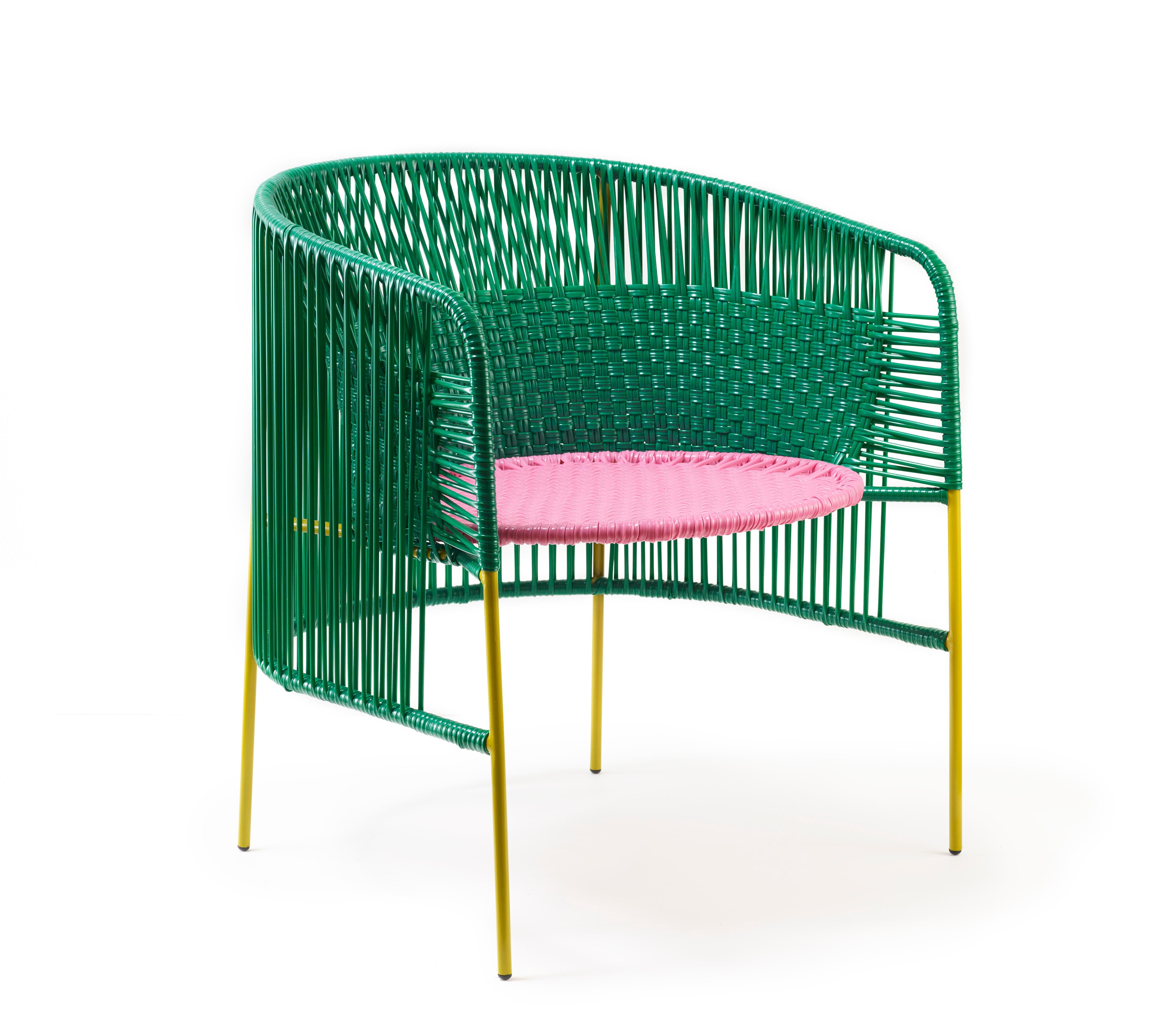 Green Caribe lounge chair by Sebastian Herkner
Materials: Galvanized and powder-coated tubular steel. PVC strings are made from recycled plastic.
Technique: Made from recycled plastic and weaved by local craftspeople in Colombia. 
Dimensions: W