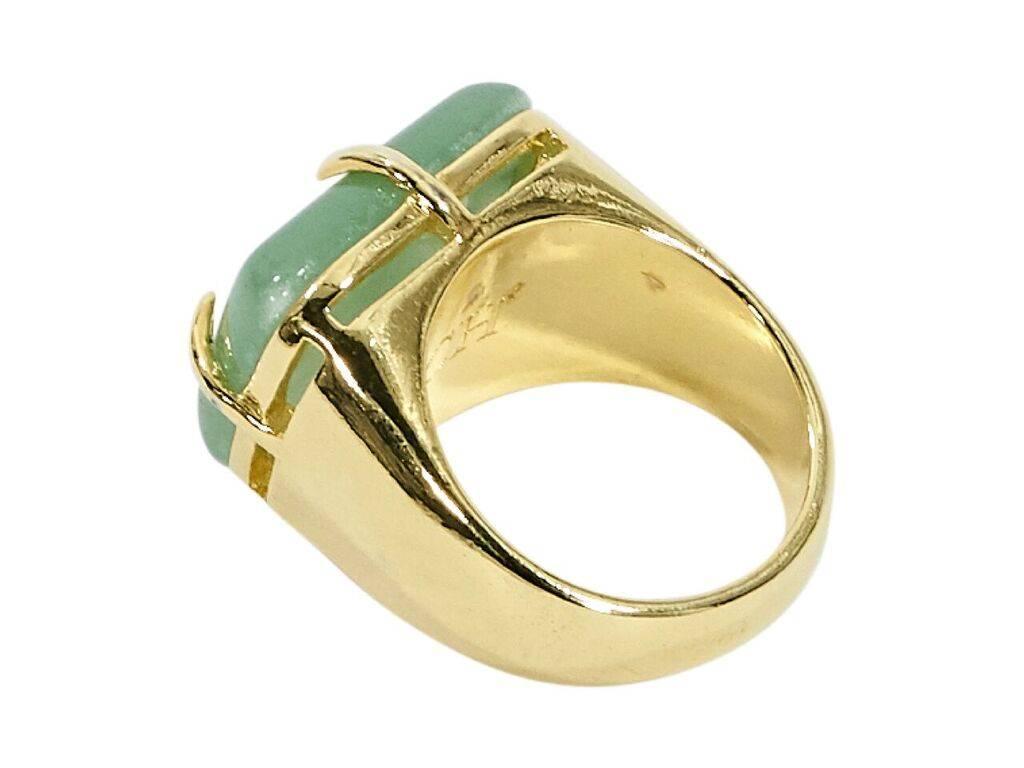 Product details:  Green stone cocktail ring by Carolina Herrera.  Goldtone hardware.
Condition: Pre-owned. Very good. 
Est. Retail $ 285.00