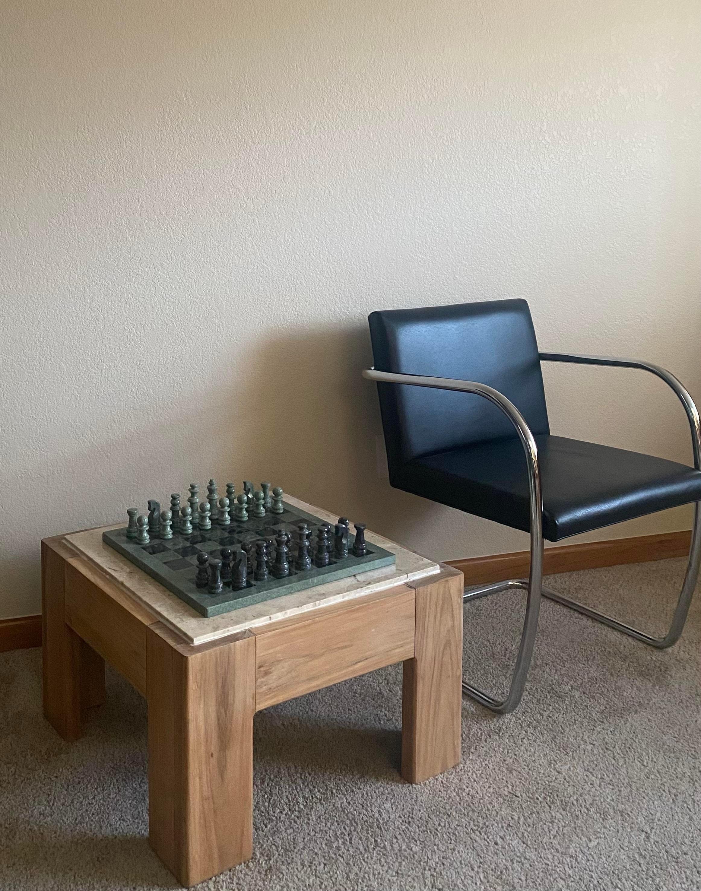 Carved green and black marble complete chess set.

Absolutely beautiful tone and quality for each carved piece. Larger and of materials and colors typically found on chess sets, we love the substantial size and heft of this set.