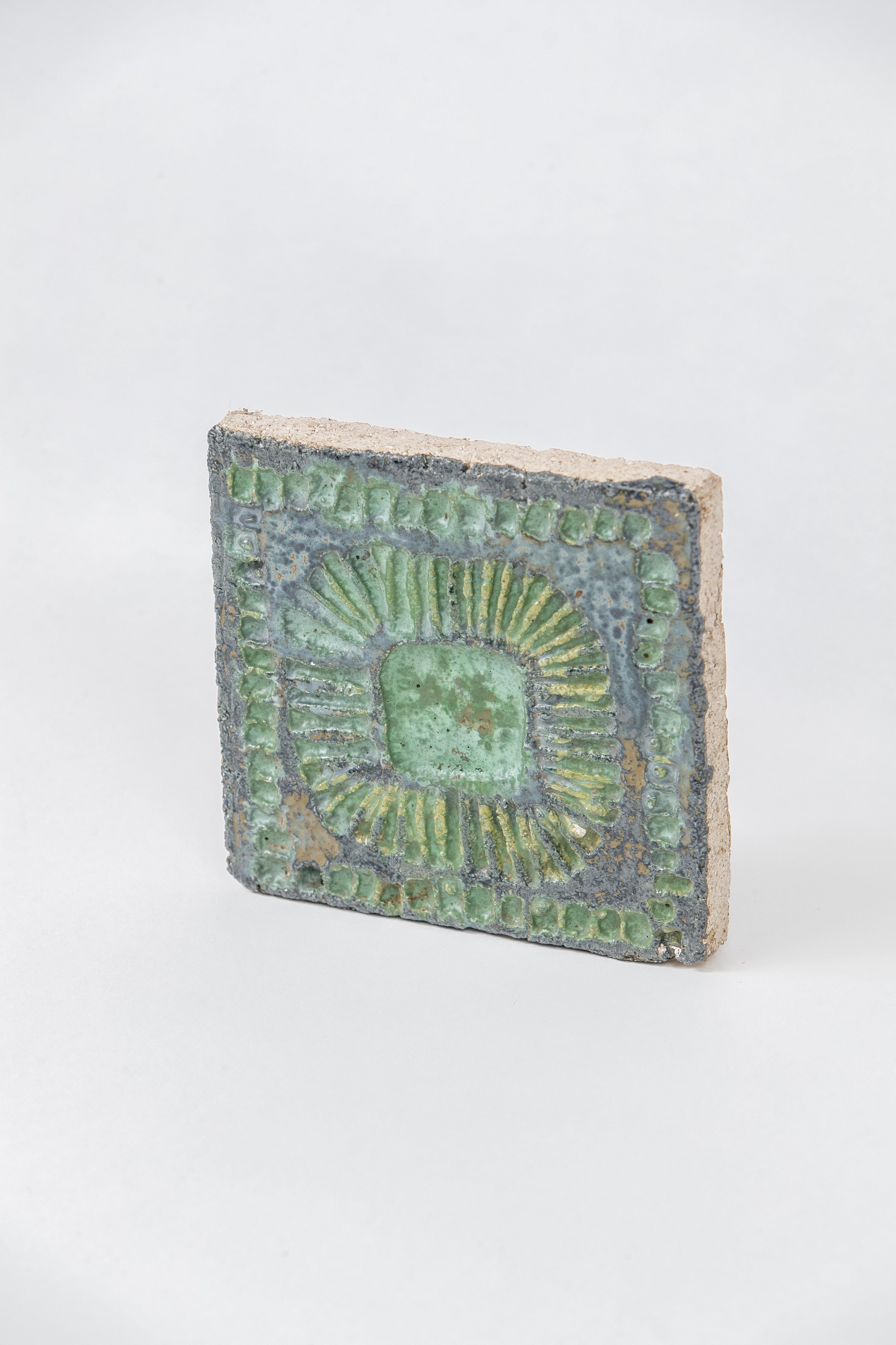 Danish tile that could be used as a paperweight, wonderful details and glaze.