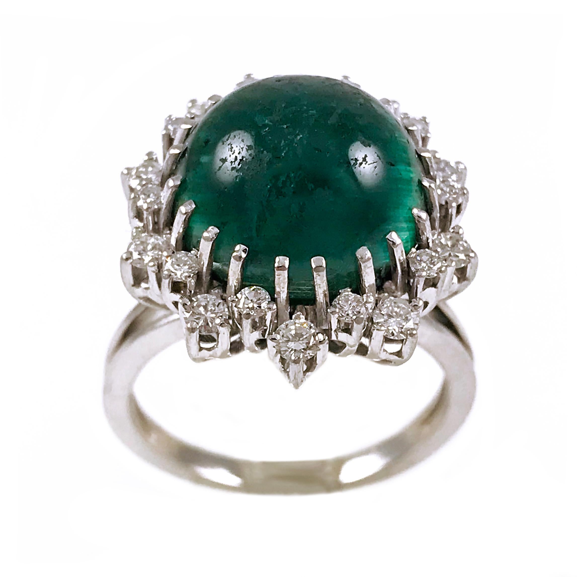 Round Cat’s Eye Green Tourmaline Diamond Cocktail Ring. Green Tourmaline is 14mm and has an approximate weight of 15.10ct. Intense beautiful green hue prong-set against 14k white gold. Prominent single band cat's eye when light hits the gemstone