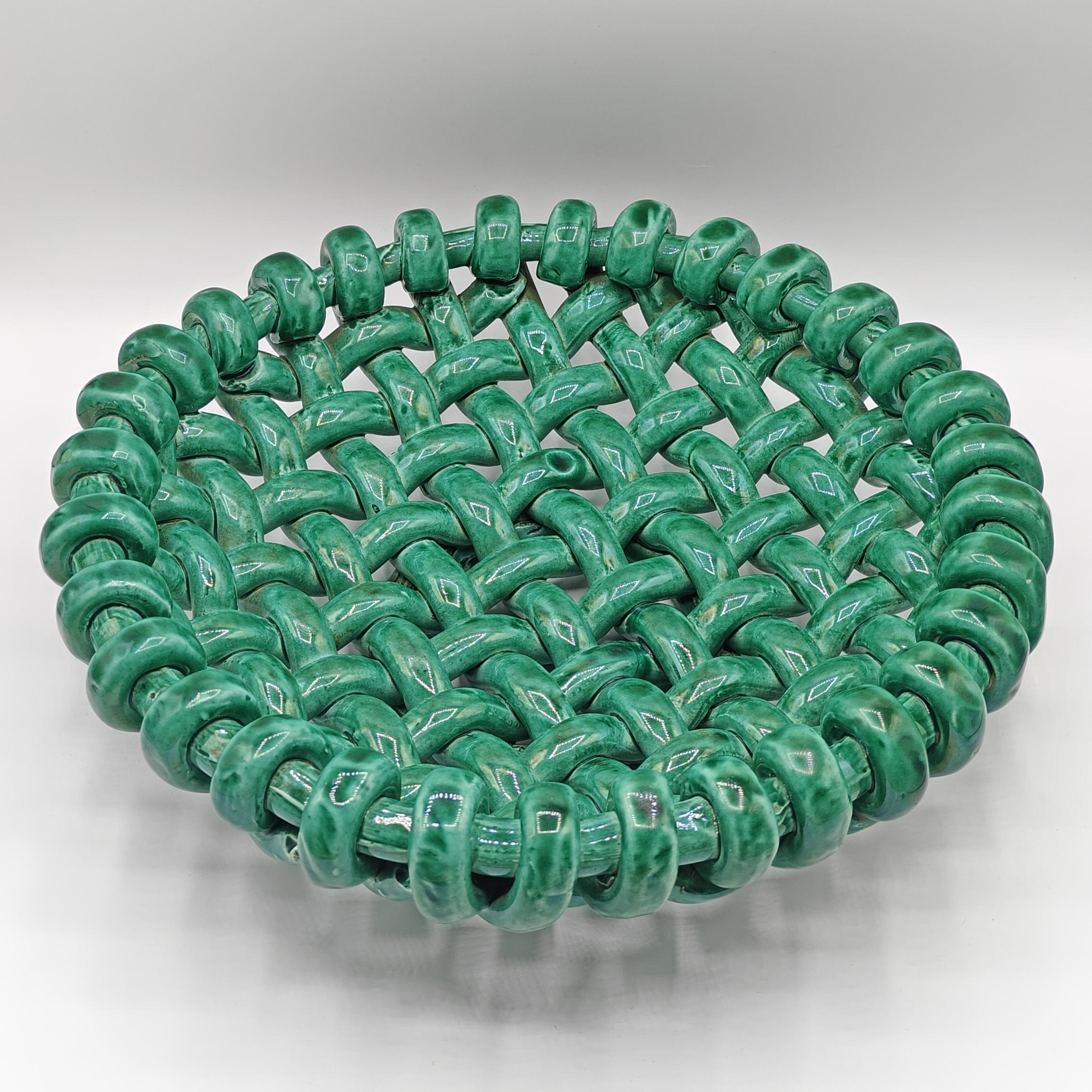 Gorgeous fruit bowl or centerpiece in braided glazed ceramic by Jérôme Massier from the 1950s, produced in his workshops in Vallauris, France. 

This bowl is covered in an absolutely fantastic green glaze, it's marvelous! Its dimensions are ideal