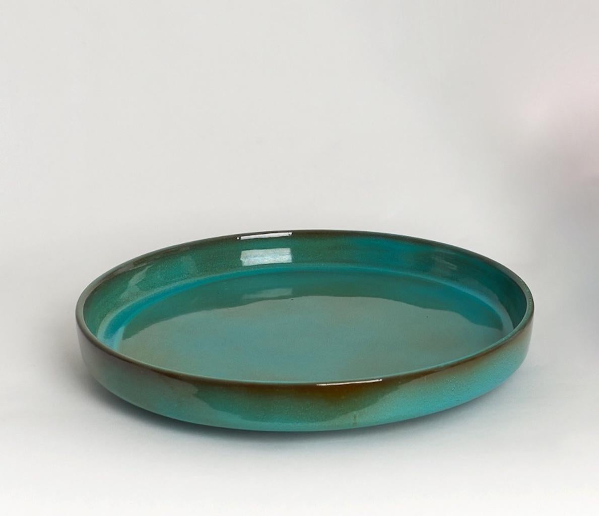 Shiny green dish or vide-poches by Jacques et Dani Ruelland, 1960s.
Signed on back
Measures: Diameter 29 cm.