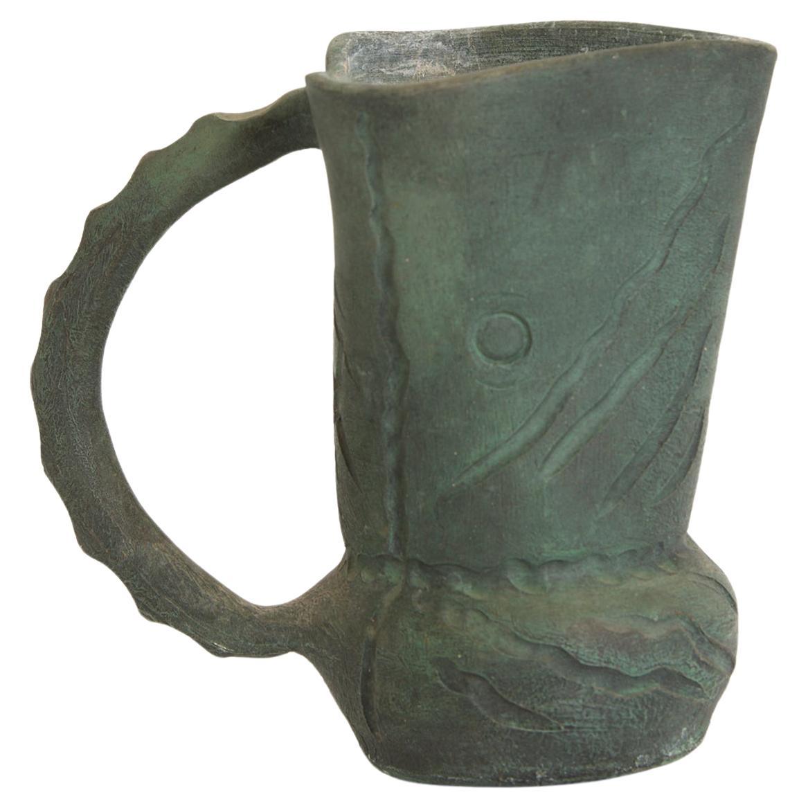 Grüner Keramikkrug