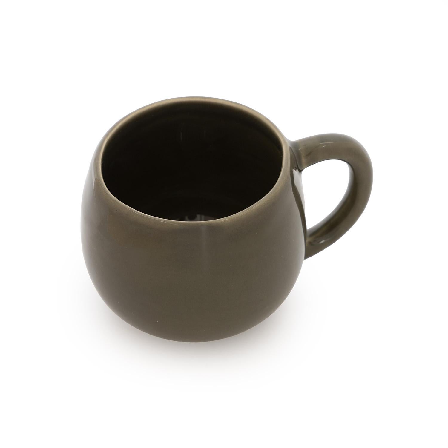 As part of our ceramic breakfast capsule, this mug is both fun and functional. Finished with a high-gloss glaze in shades of purple, brown, and green, it can be used on its own or combined with the matching tray and espresso cup to create a full