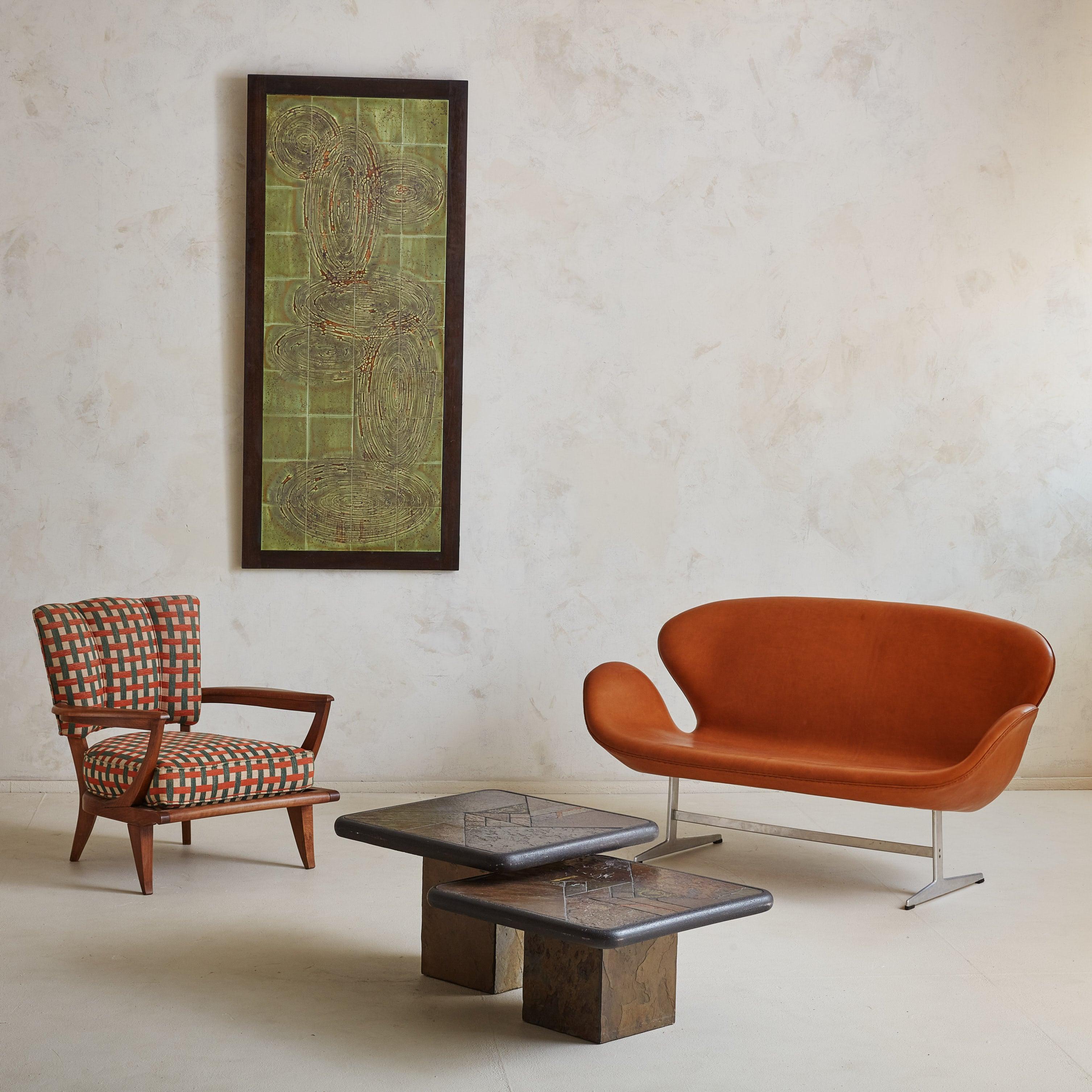 A 1960s French table top wall sculpture signed by ceramic artist Jean D'asti. During the Mid 20th Century, Jean D'asti operated his workshop in Vallauris, a picturesque seaside village in the South of France renowned for its pottery. This piece has