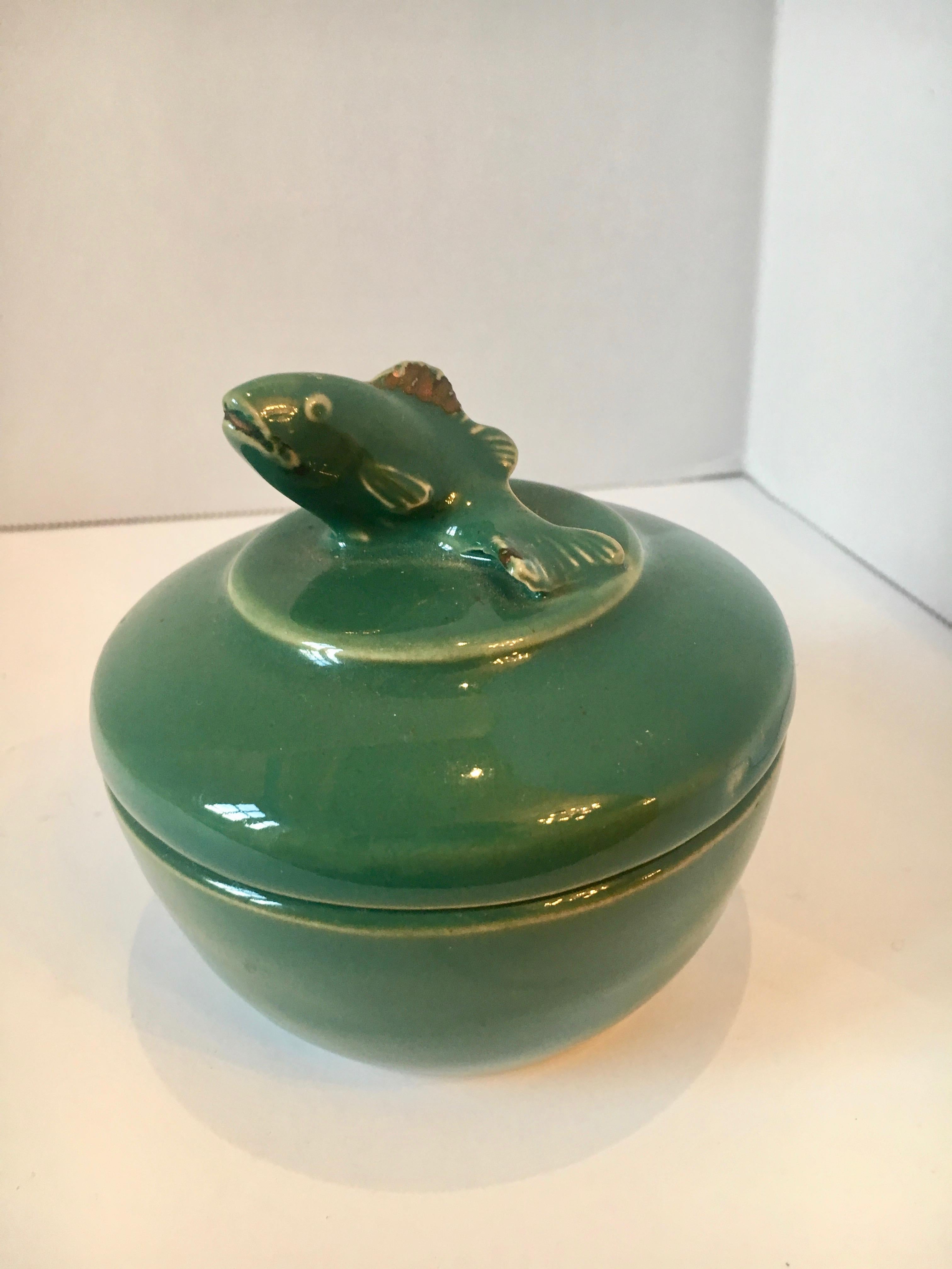 Green ceramic trinket box with fish motif lid - a perfect spot for small jewels, mens clips and change. A great gift for dad or the office. and perfect for the dressing table or vanity.