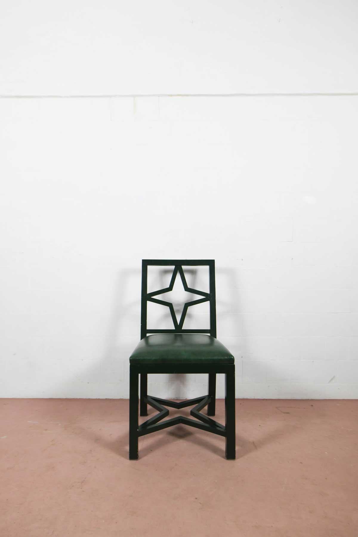 Dark green chairs with leather seat and lacquered wood structure. Italian Manifacture, 1980s. 10 available.