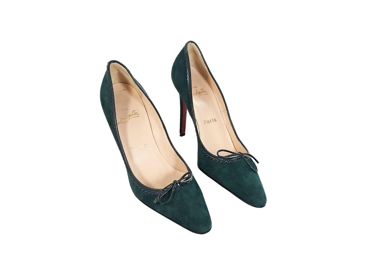 Product details:  Green suede pumps by Christian Louboutin.  Accented with scalloped leather trim.  Point toe.  Iconic red sole.  Slip-on style.  4