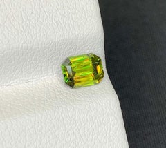 Green Chrome Sphene Gemstone: Lustrous Emerald Cut Titanite, 0.80 CT