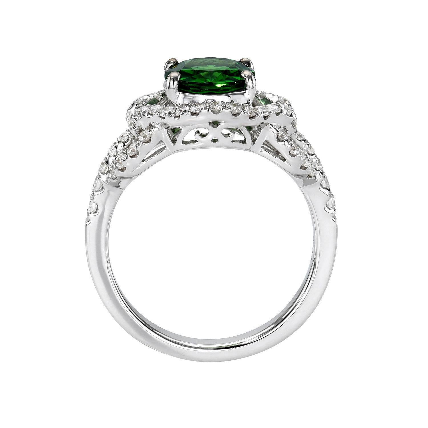 Very fine 1.86 carat green Chrome Tourmaline 18K white gold ring, decorated with round brilliant diamonds totaling 0.56 carats.
Ring size 6.25. Resizing is complementary upon request.
Returns are accepted and paid by us within 7 days of delivery.