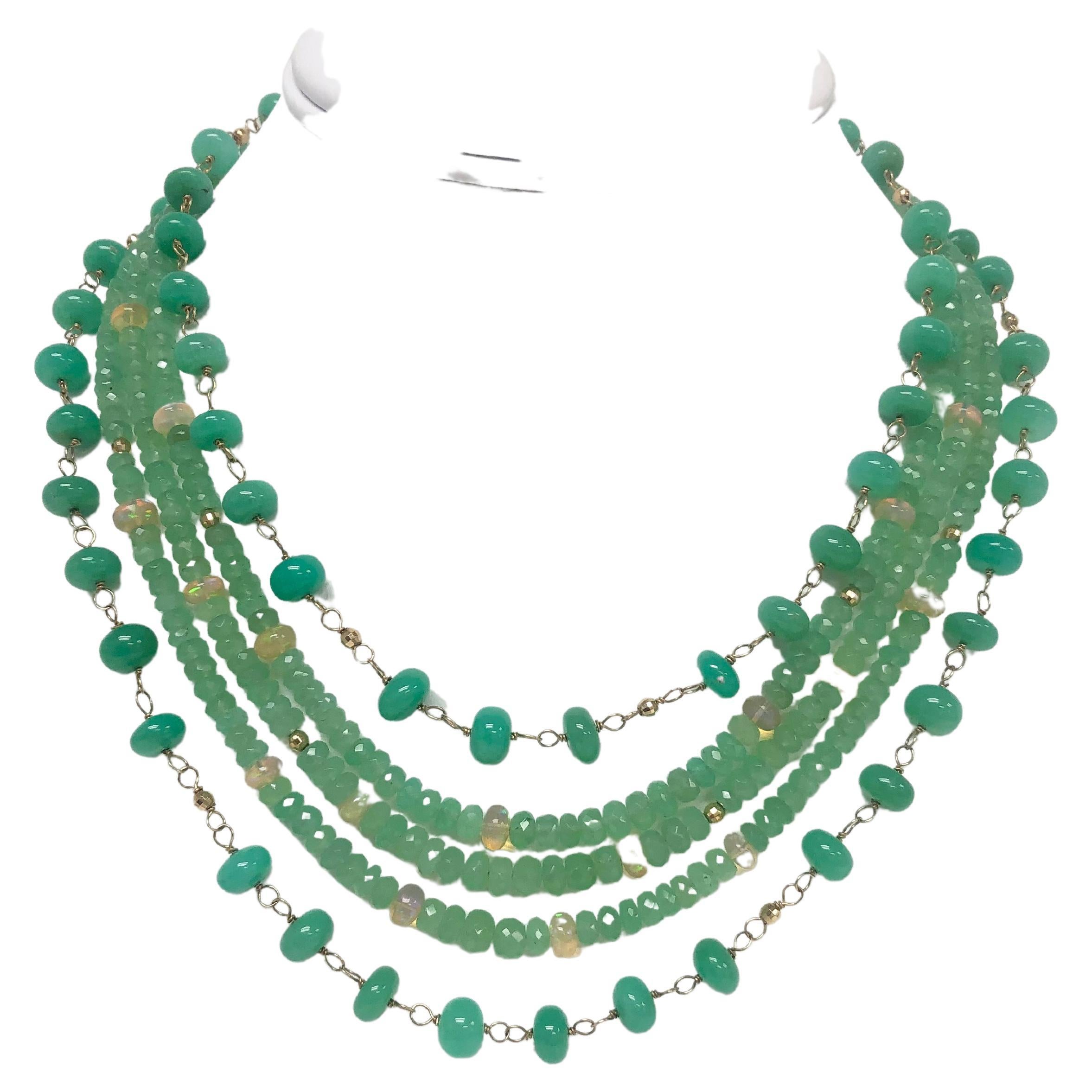 Green lover’s heaven, vibrant color 323 carats Chrysoprase and 11 carats Walo Ethiopian Opals, five-strand necklace. 
Item # N3764

Materials and Weight
Chrysoprase, two strands, 8mm smooth, rondelle shape, 158 carats.
Chrysoprase, three strands, 4