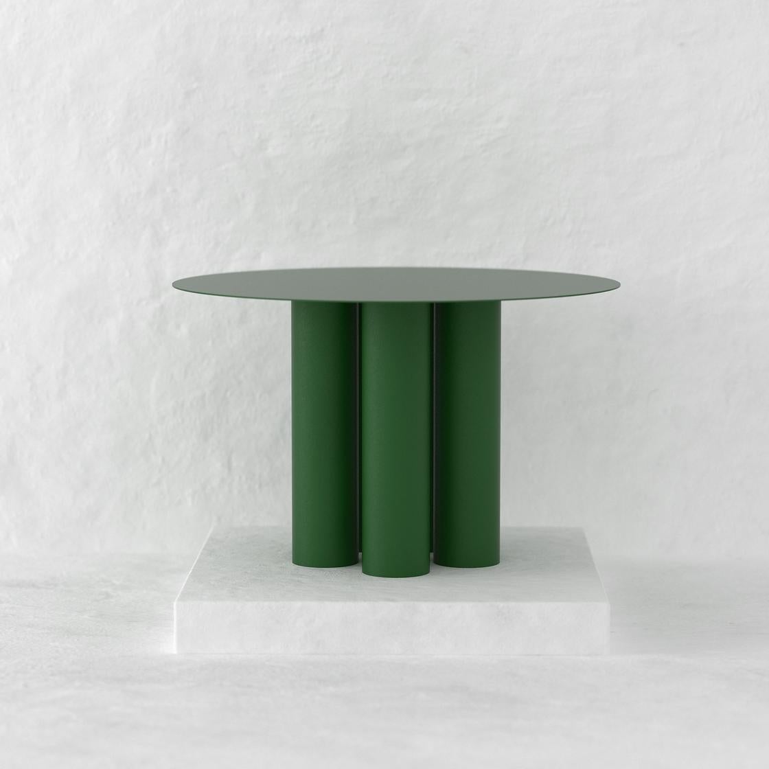 The Chunky Dining Table console explores repetition and sequence while functioning as a dining table suitable for both, indoor and outdoor. 
Crafted by hand in metal and coated with a matte electrostatic finish it's diameter can be customized.
With