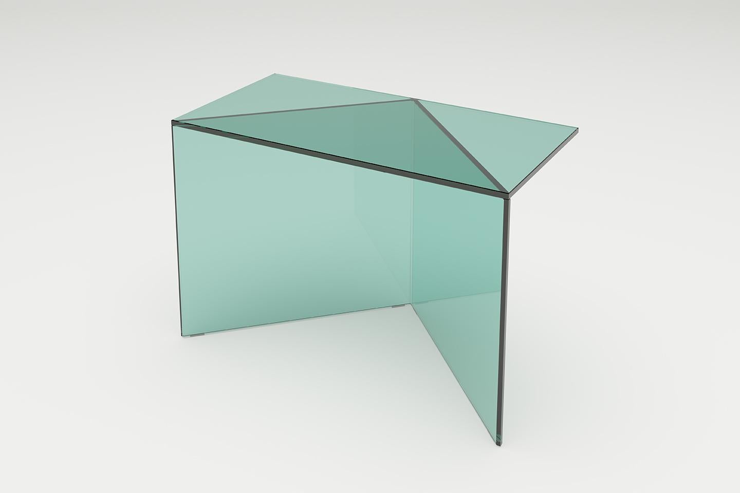 Green Glass Poly square coffe table by Sebastian Scherer
Dimensions: D60 x W30 x H40 cm
Materials: Solid coloured glass.
Weight: 12.7 kg.
Also Available: Colours:Clear white (transparent) / clear green / clear blue / clear bronze / clear