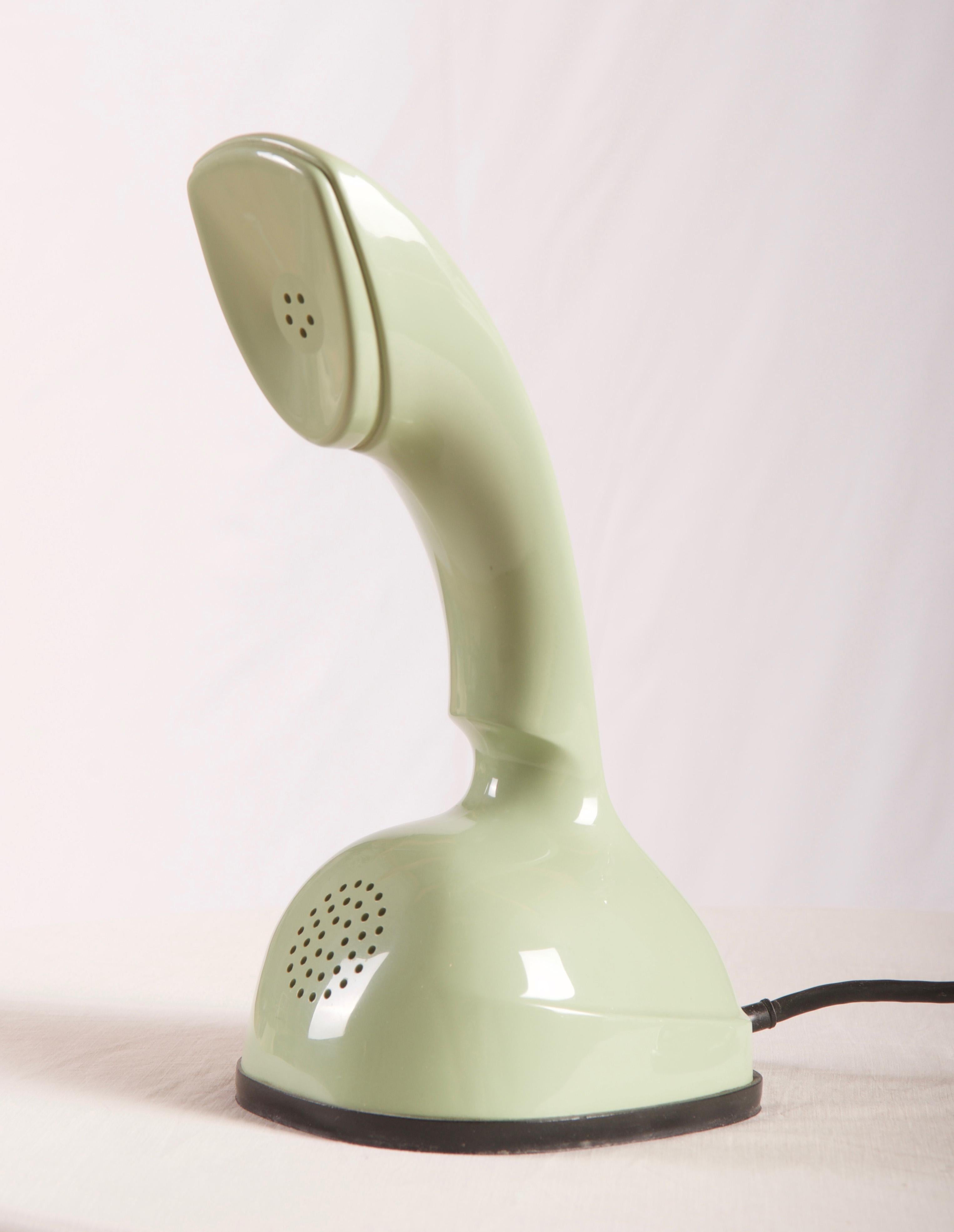 Vintage Rotary dial green ericofone. This is the model Cobra. It is made of thermoplastic ABS
Designed in the 1950s in Sweden by Hugo Blomberg, Ralph Lysell and Gösta Thames, LM Ericsson.
 