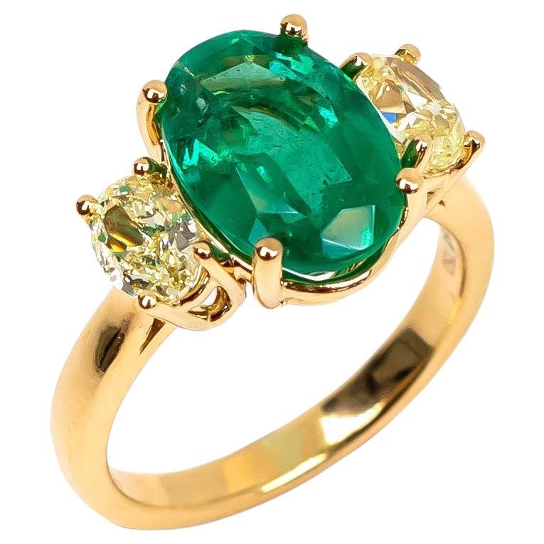 3.54ct Green Colombian Oval Emerald and Yellow Diamond Ring in 18K Yellow Gold For Sale