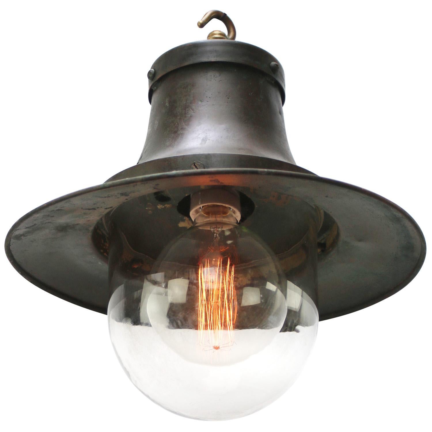 1920s Grand green copper and brass pendant lamp
clear aged glass

Weight: 3.30 kg / 7.3 lb

Priced per individual item. All lamps have been made suitable by international standards for incandescent light bulbs, energy-efficient and LED bulbs.