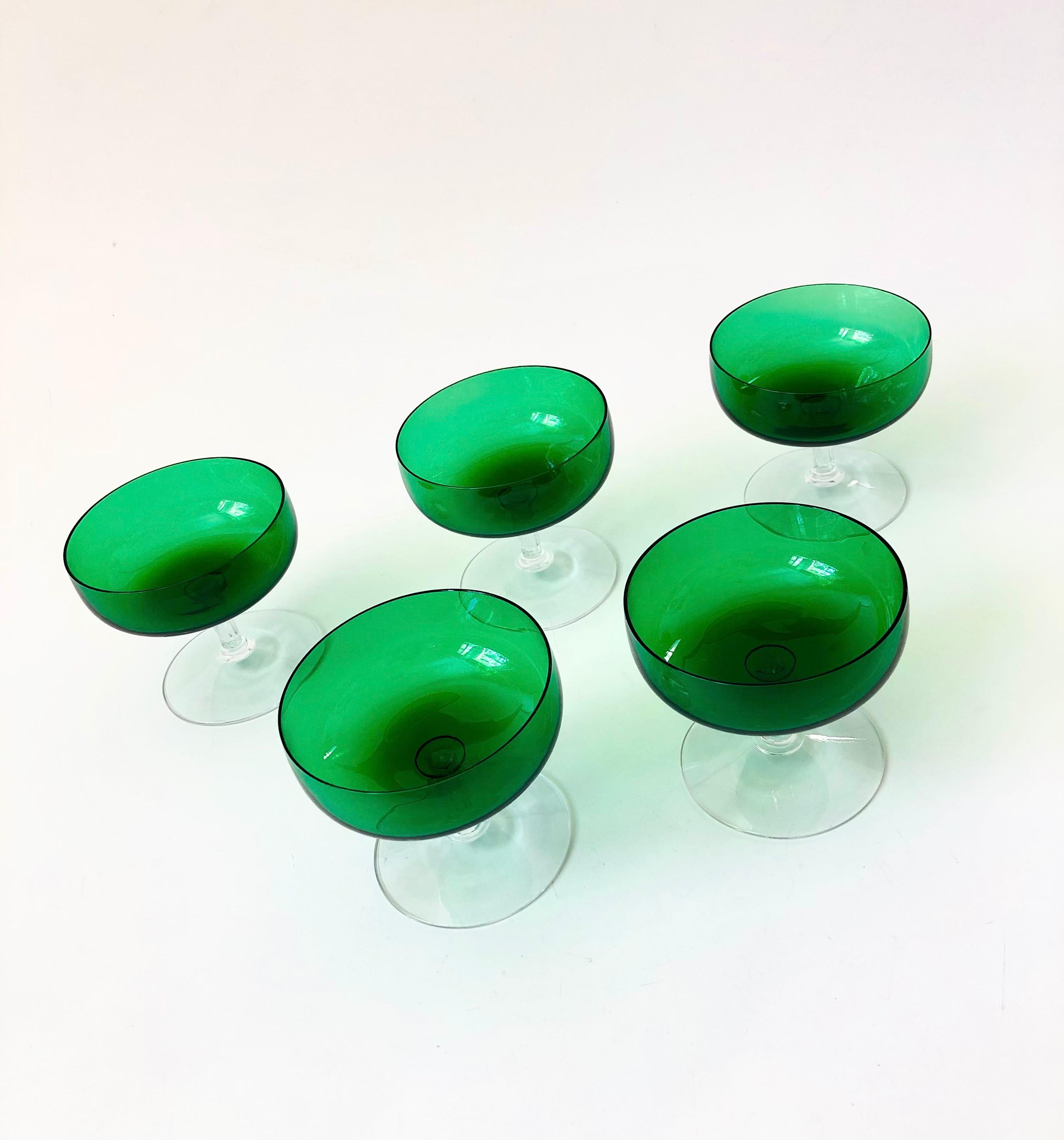 A set of 5 vintage coupe glasses with vibrant emerald green tops and clear stems. Perfect for serving champagne. 

