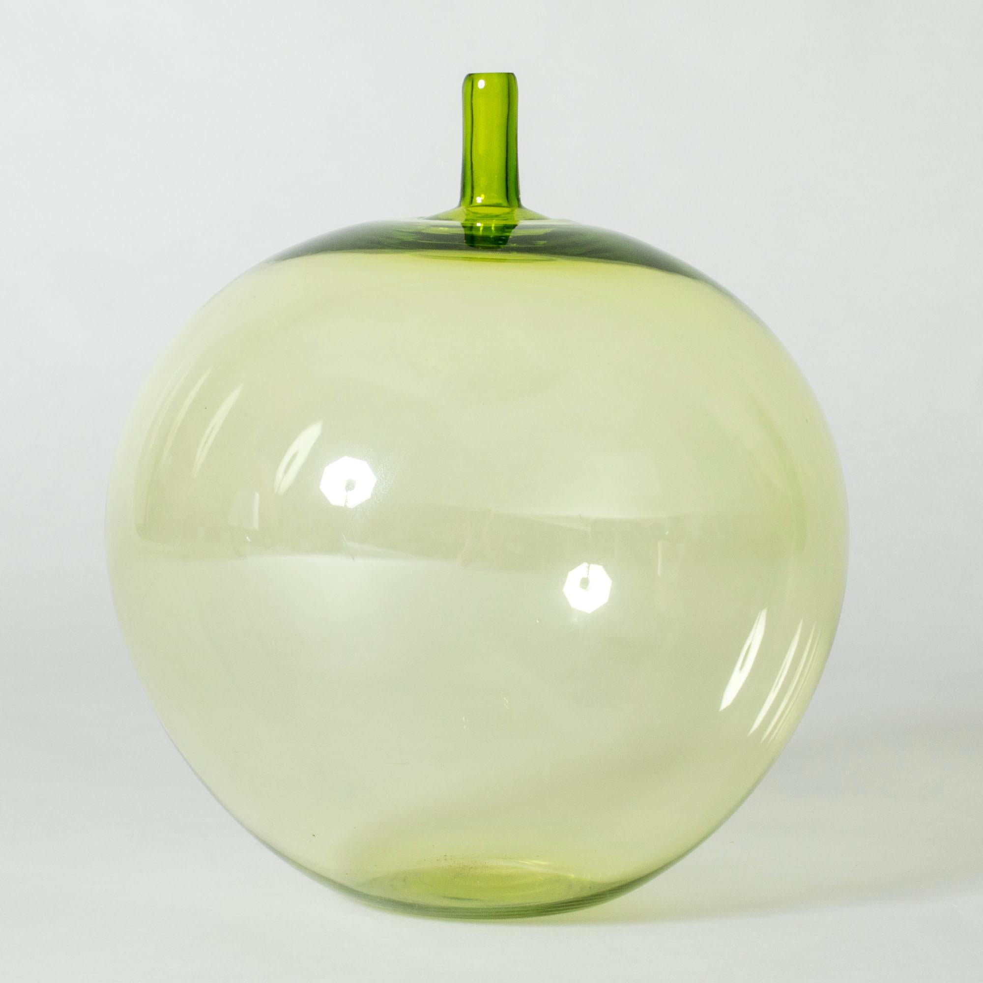 Stunning crystal glass apple by Ingeborg Lundin, tinted crispy green. The apple is an iconic piece, composed in 1955 and was first presented at H55 where it caused a sensation. The design is the epitome of Lundin’s pure, gracious style.

About
