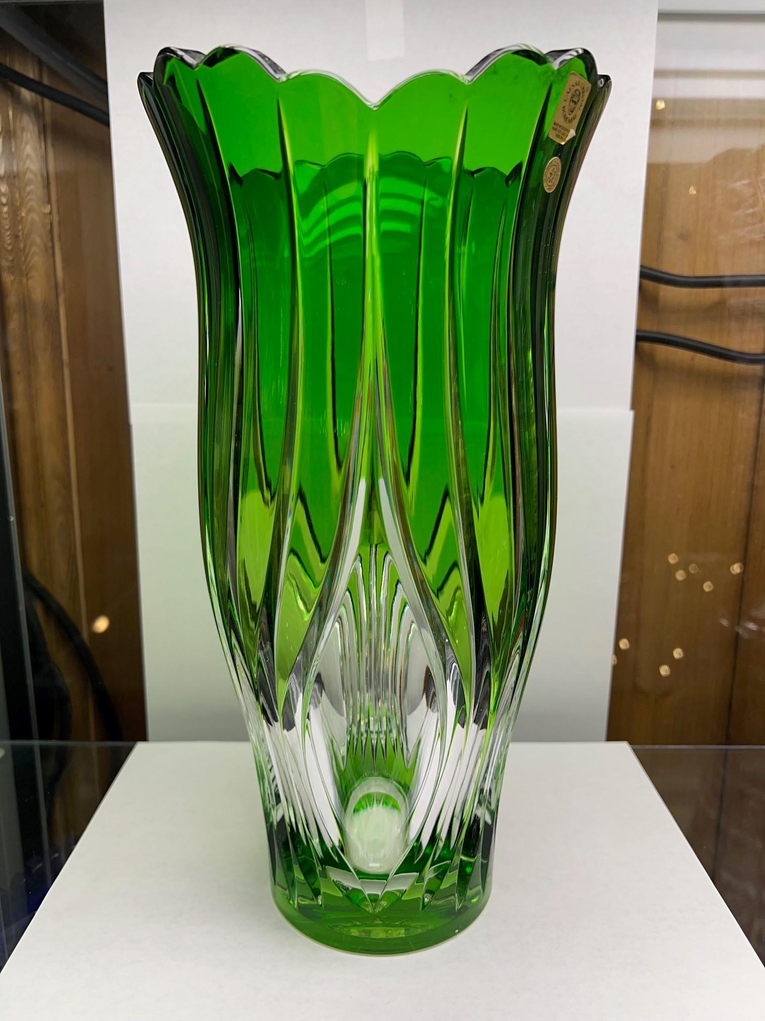 Stunning hand cut lead crystal vase created as a work of art by the hands of the finest Czech glass workers. The Caesar Crystal Company in the Czech Republic has been selling hand cut lead crystal pieces since 1861 and is known as one of the finest