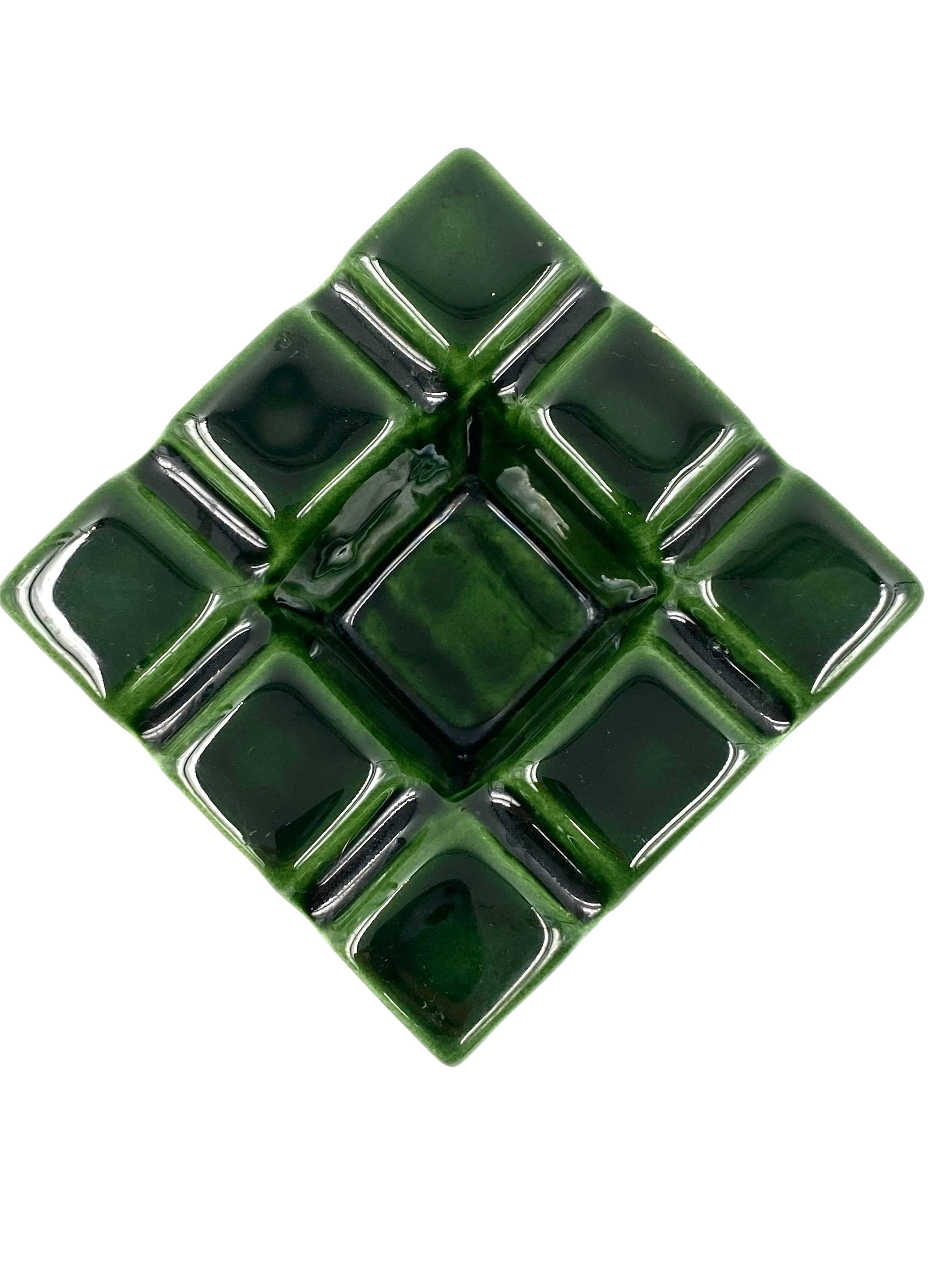 Green cubic ceramic ashtray.

Sicart 1970s, Italy

Measures : H: 9 cm

11.5 x 11.5 cm

Conditions: Good consistent with age use. Small chip on one angle.