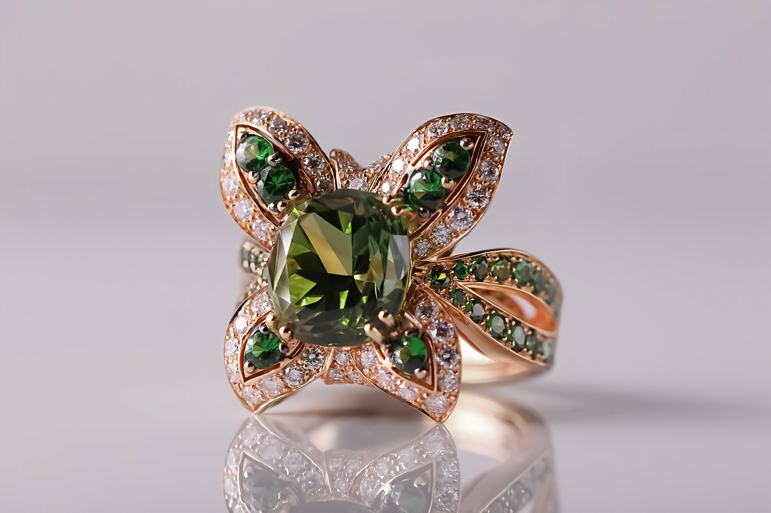 This charming 18kt rose gold ring is a designer jewel made in Florence, Italy. Its enchanting butterfly motif captures the imagination with elegance and grace.

At the centre of the ring shines a cushion-cut natural green Tourmaline from Madagascar,