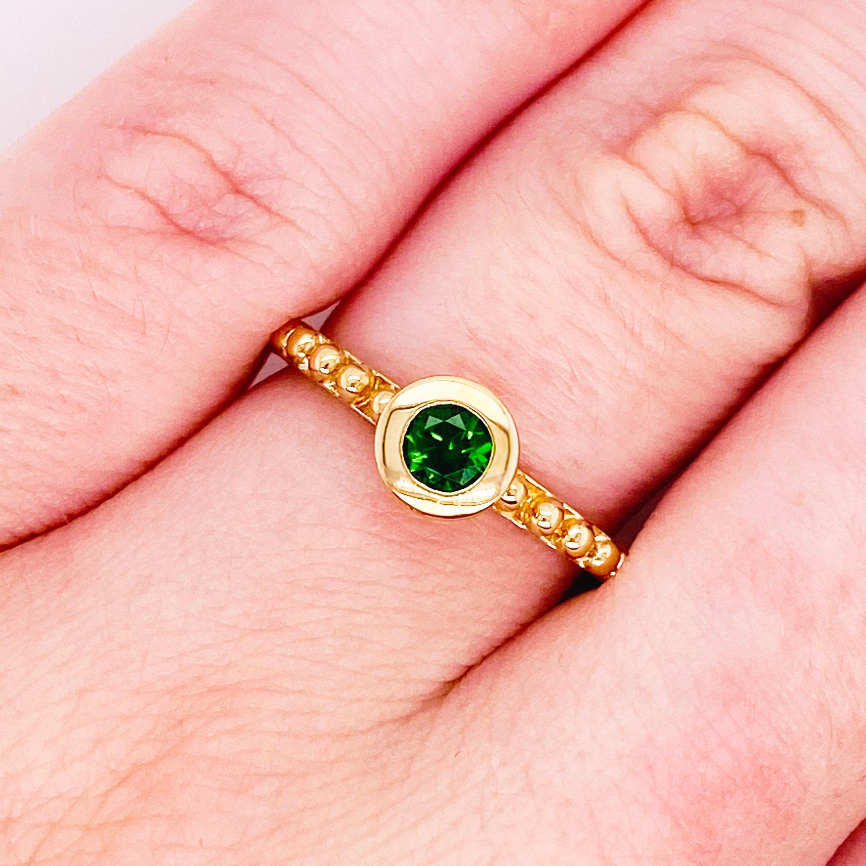 This stunningly beautiful rare diopside mined in Russia is known for its rarity and amazing color.  It is set in 14kt yellow gold would make anyone thrilled to receive it! This ring provides a look that is very modern and classic at the same time!