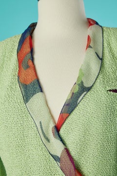 Green double breasted skirt-suit and printed skirt Chanel