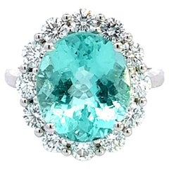 Greene & Greene: anello con diamante aureolato