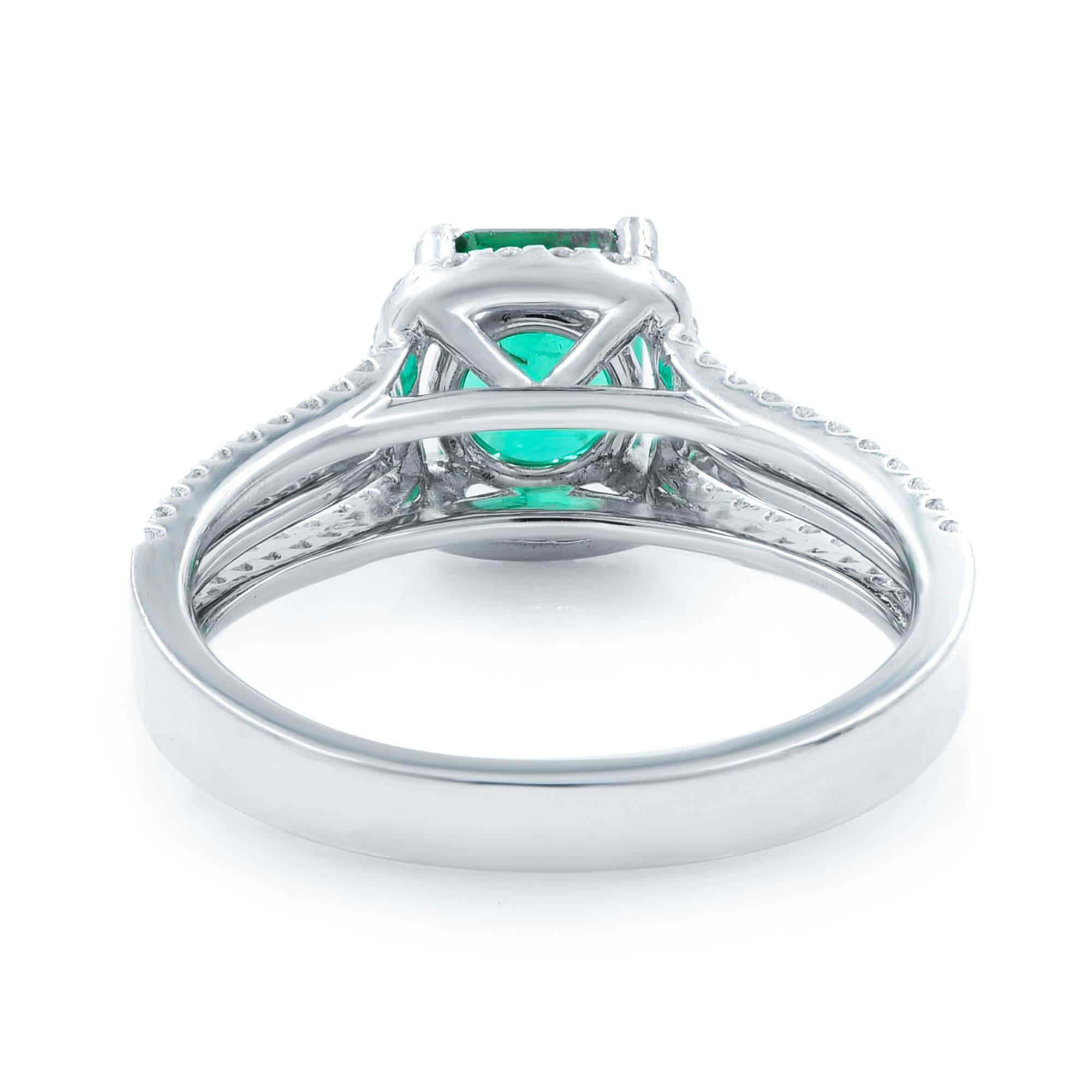 Modern Green Emerald 1.00 Cttw and Diamond 0.65 Cttw Halo Ring 18K White Gold For Sale