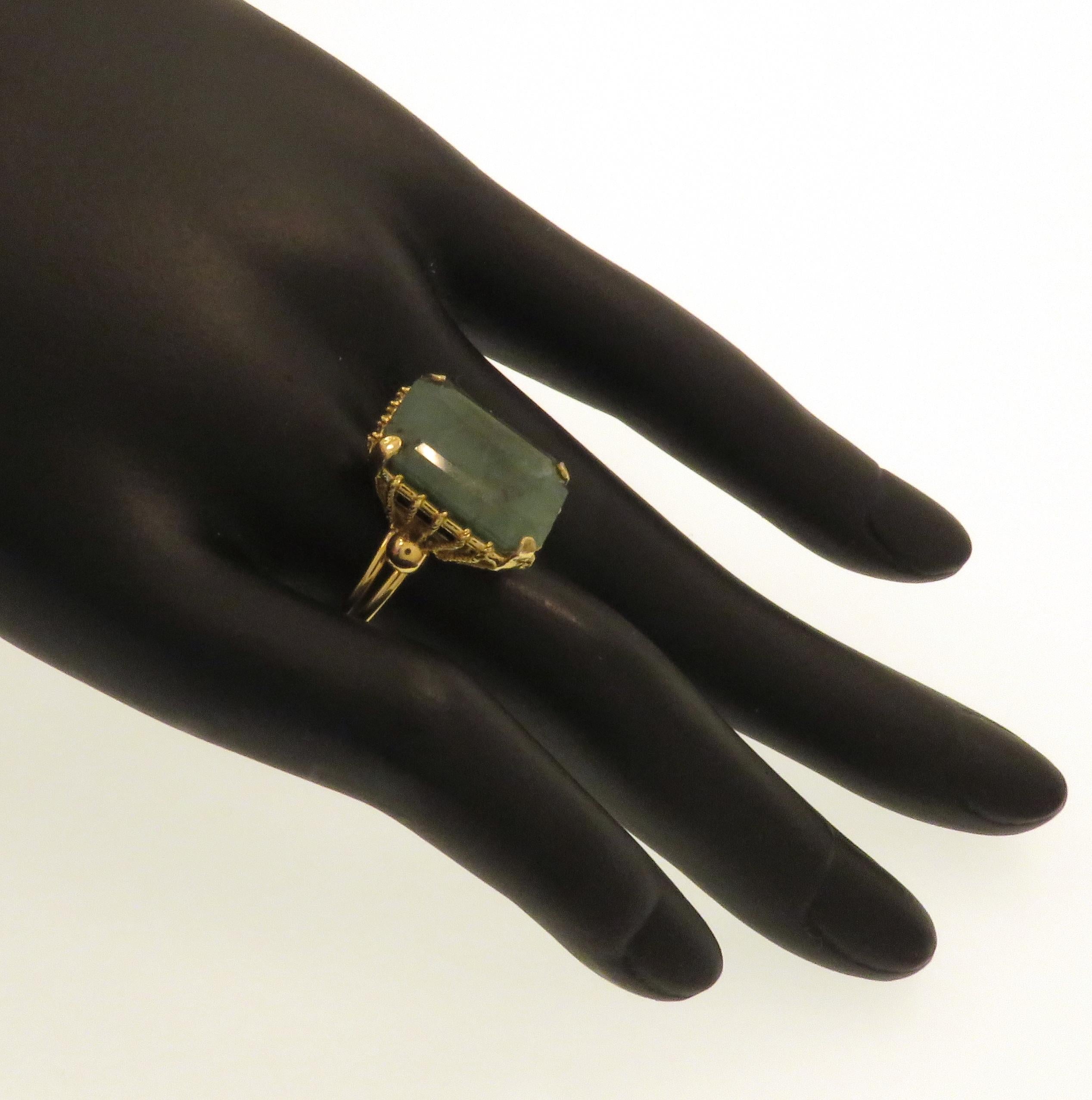 Beautiful vintage cocktail ring handcrafted in 18 karat yellow gold with a large green emerald. The dimension of the emerald is: 16x12 mm - 0,629x0,472 inches. Finger size is: US 7, French 55, Italian 15, resizable to the customer's size before