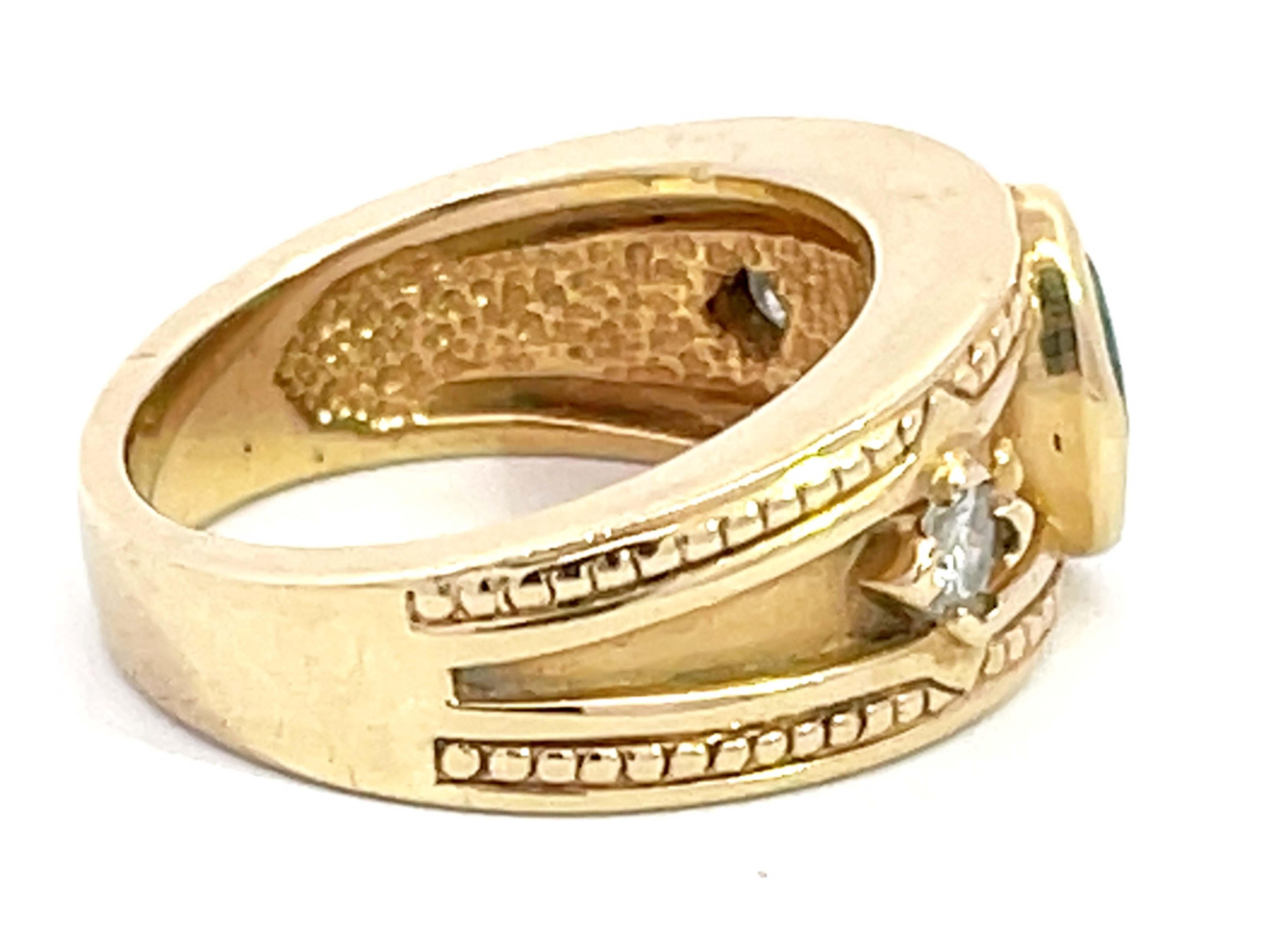 Oval Cut Green Emerald and Diamond Cigar Band Ring in 14k Yellow Gold