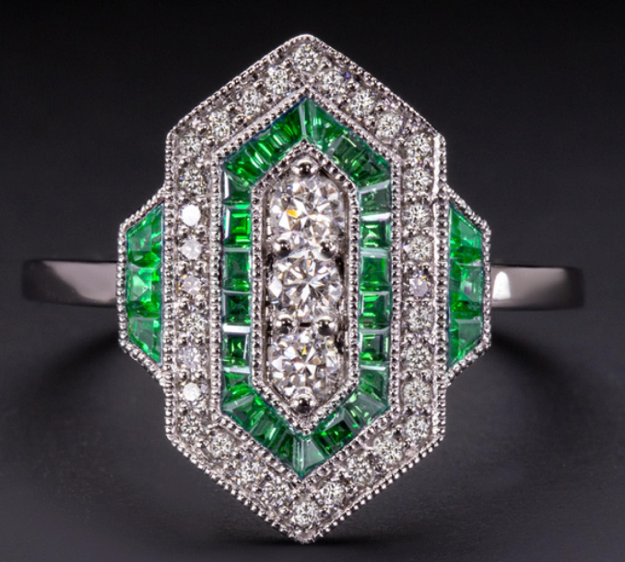 This beautiful diamond and emerald ring based on an iconic and elegant aesthetic from the Art Deco era! 

The chic geometric design shines with vibrant diamonds and is punctuated by spring green lines of meticulously cut emeralds.

The effect is