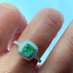 Green emerald and diamond double halo engagement ring 18k white gold