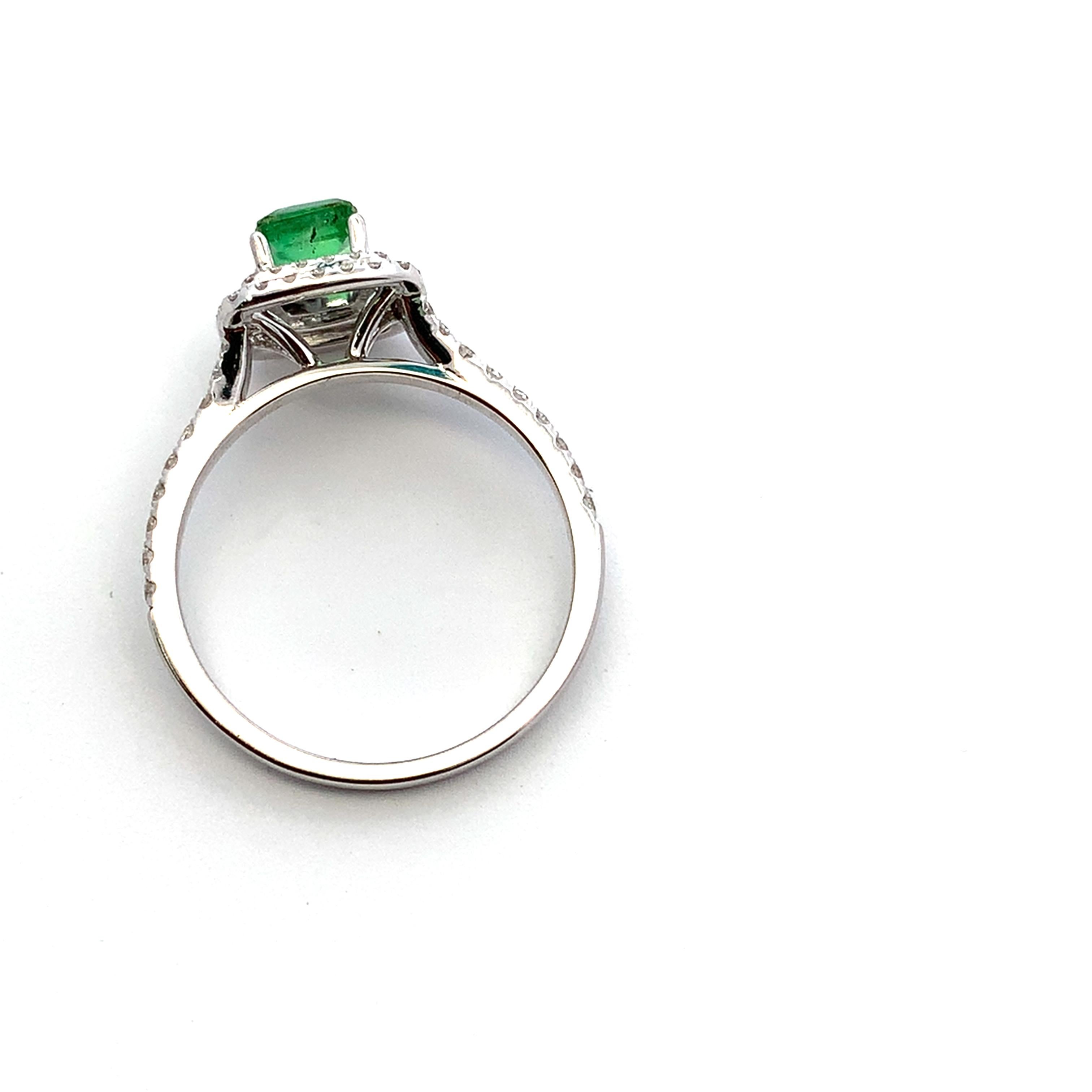 Emerald Cut Green emerald and diamond double halo engagement ring 18k white gold For Sale