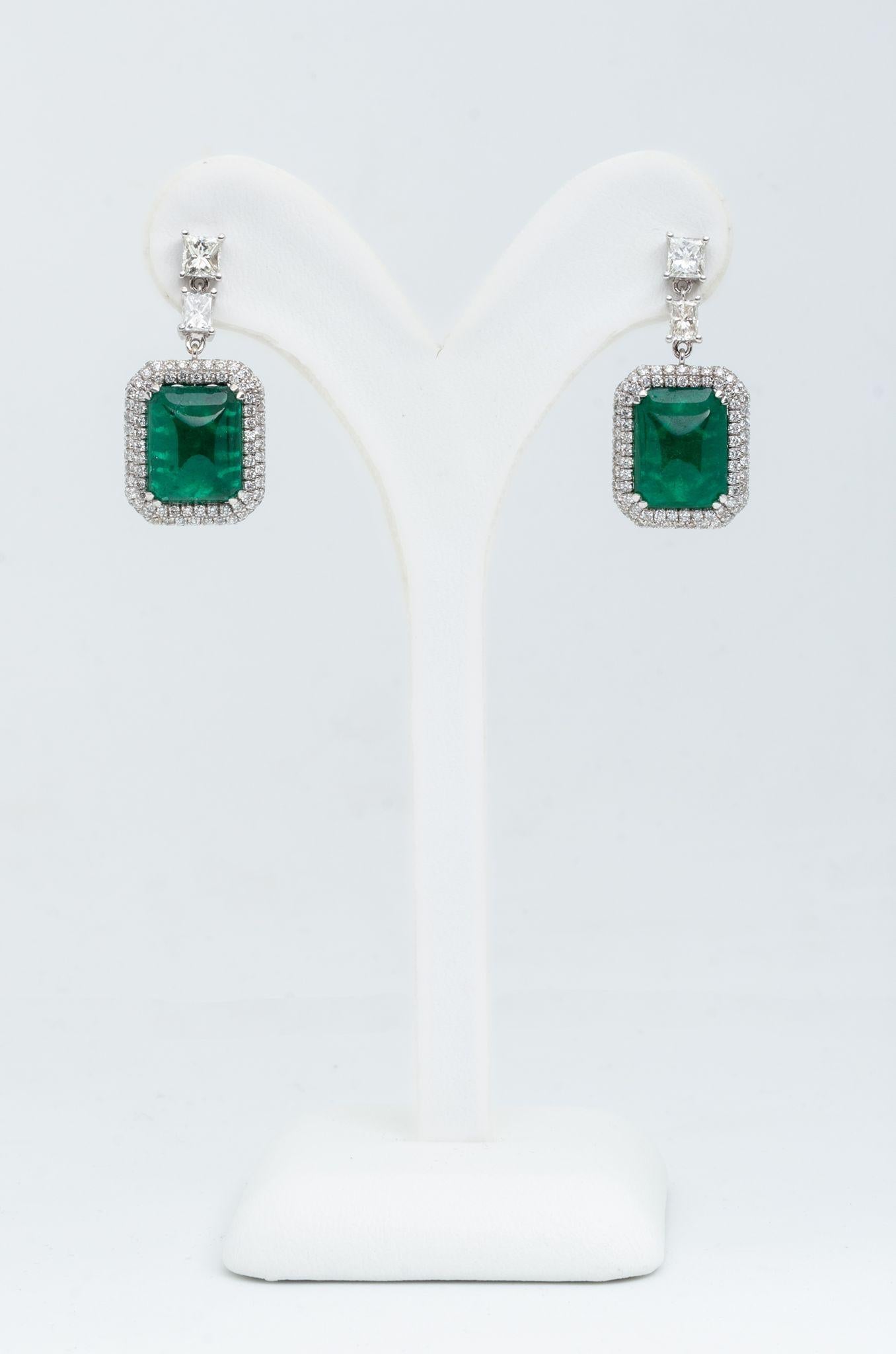 Green Emerald and Diamond Drop Earrings in 18 K White Gold 
Magnificient green Emerald stones (2 pieces Total Weight 8.75 Carat), arranged around natural diamonds (300 pieces Total Weight 2.96 Carat) in Round and princess cut, creating a majestic