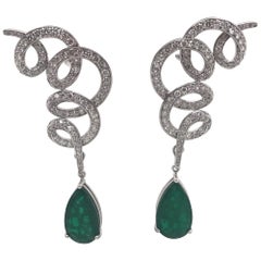 Green Emerald and Diamond Drop Swirl Earrings 28.47 Carat 18 Karat White Gold