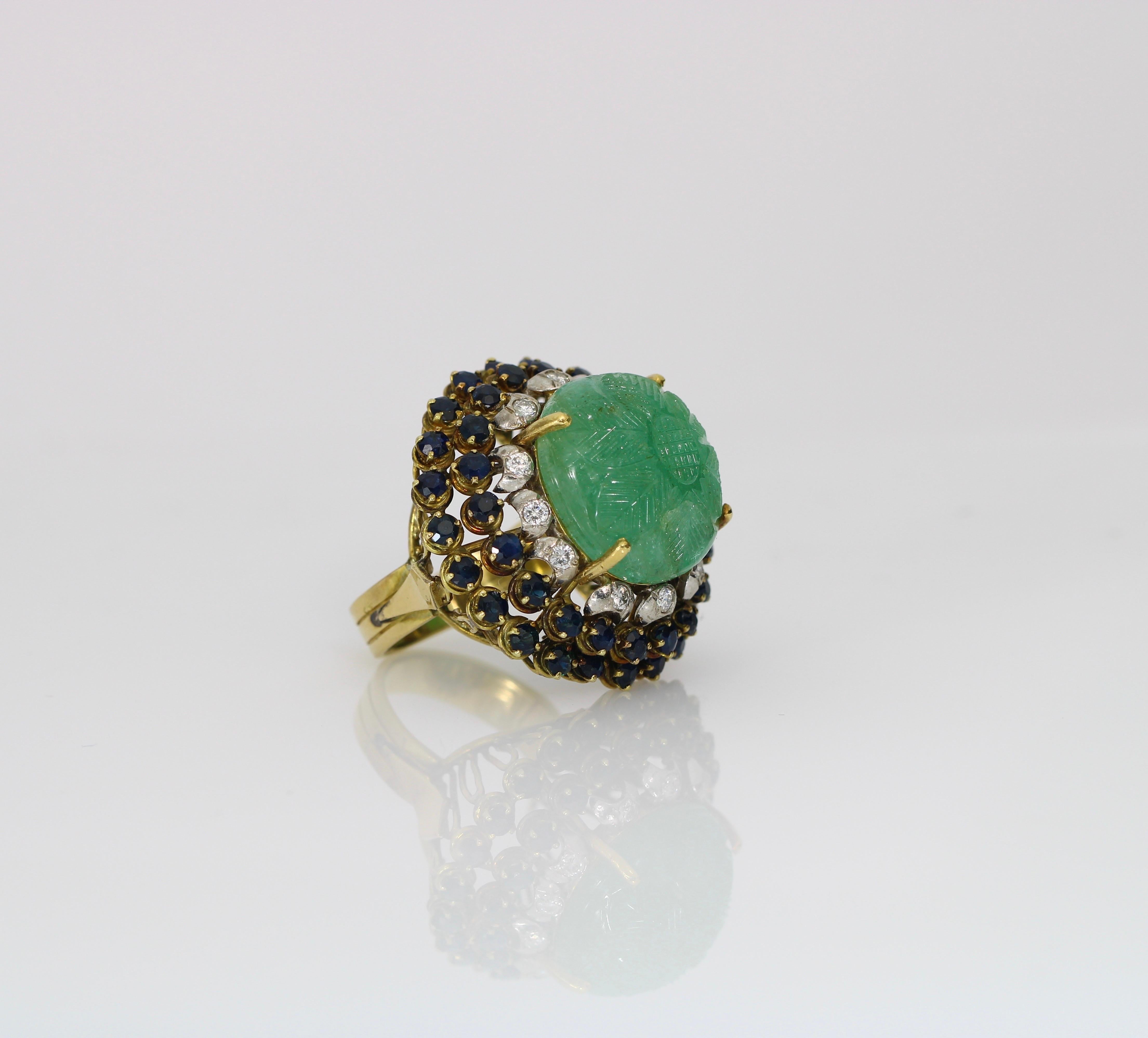 Introducing a stunning masterpiece: an 18.13x10.30 mm green emerald and diamond vintage cocktail ring, crafted in solid 18k yellow gold. This exquisite piece features a high-domed, oval cabochon cut emerald solitaire, prong set at the center,