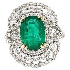Green emerald and diamonds cocktail ring 18k white gold
