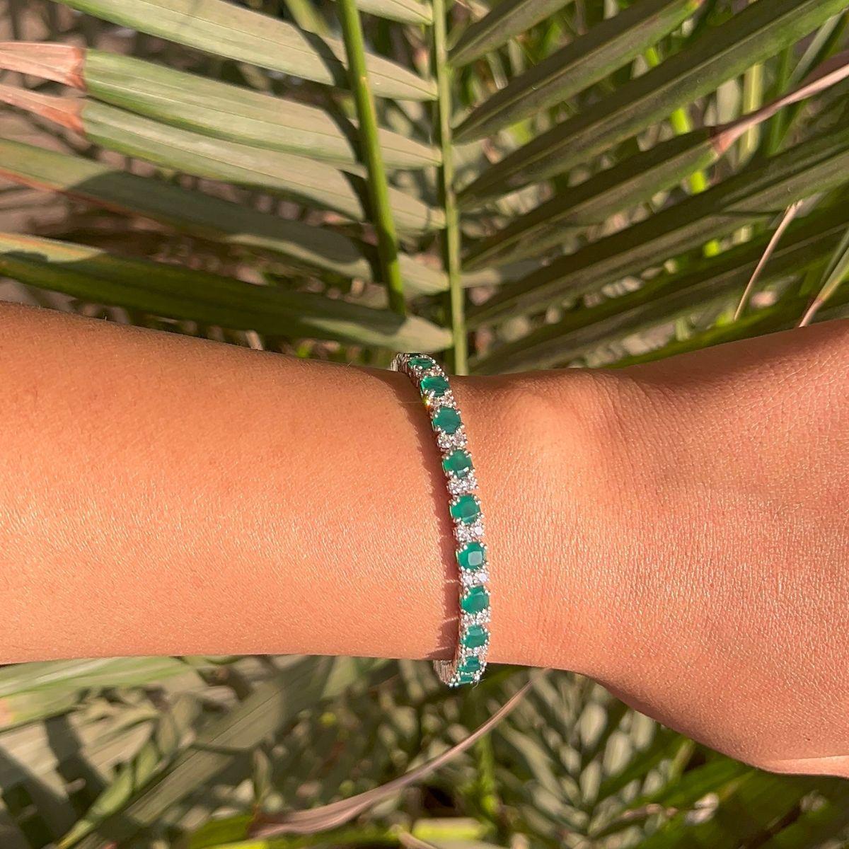 Zirconia & Emerald Gem Line Tennis Bracelet in 925 Sterling Silver. You shall need statement tennis bracelet to make a statement with your look. Each piece features dazzling cubic zirconia stones, renowned for their brilliance and clarity, set in