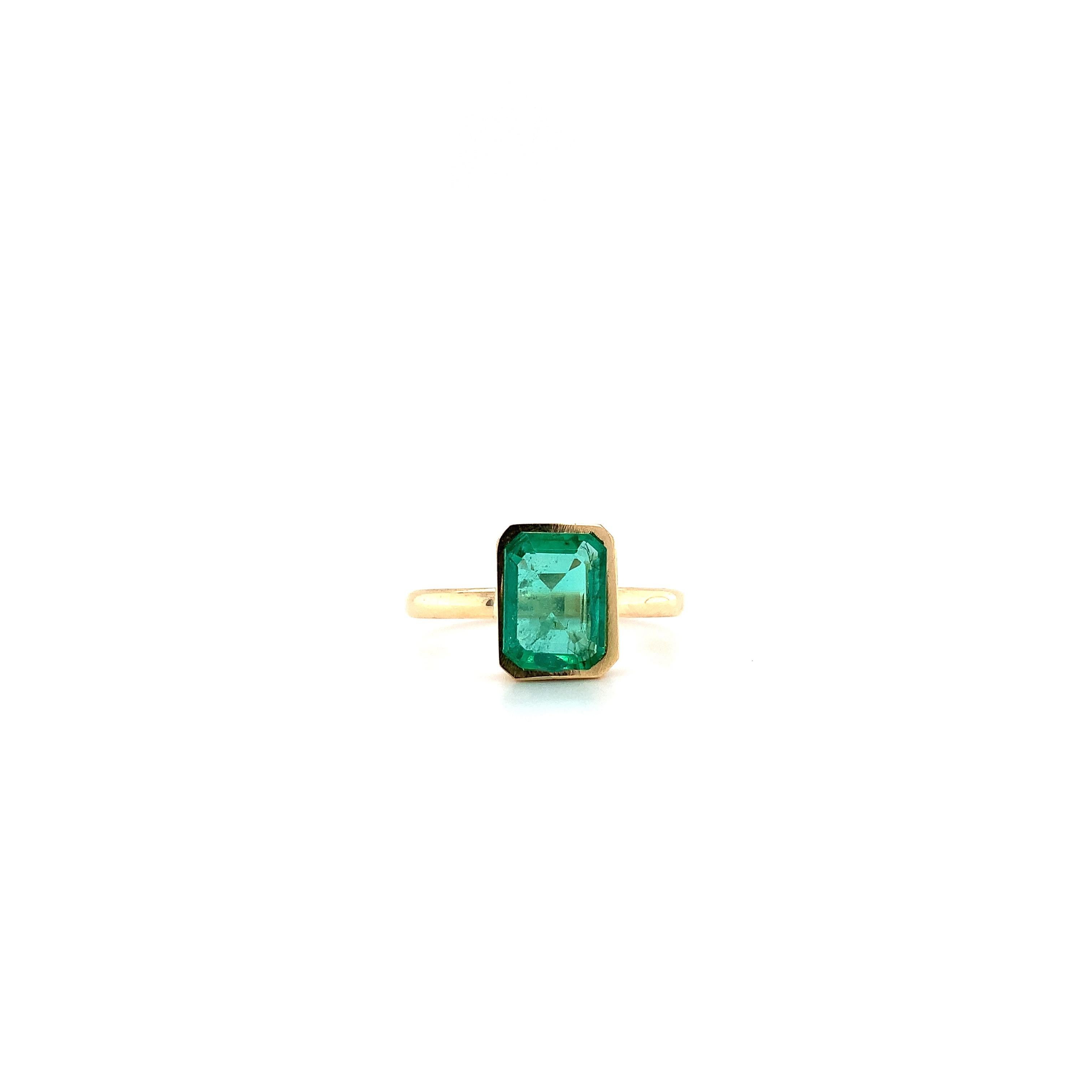 modern emerald ring
