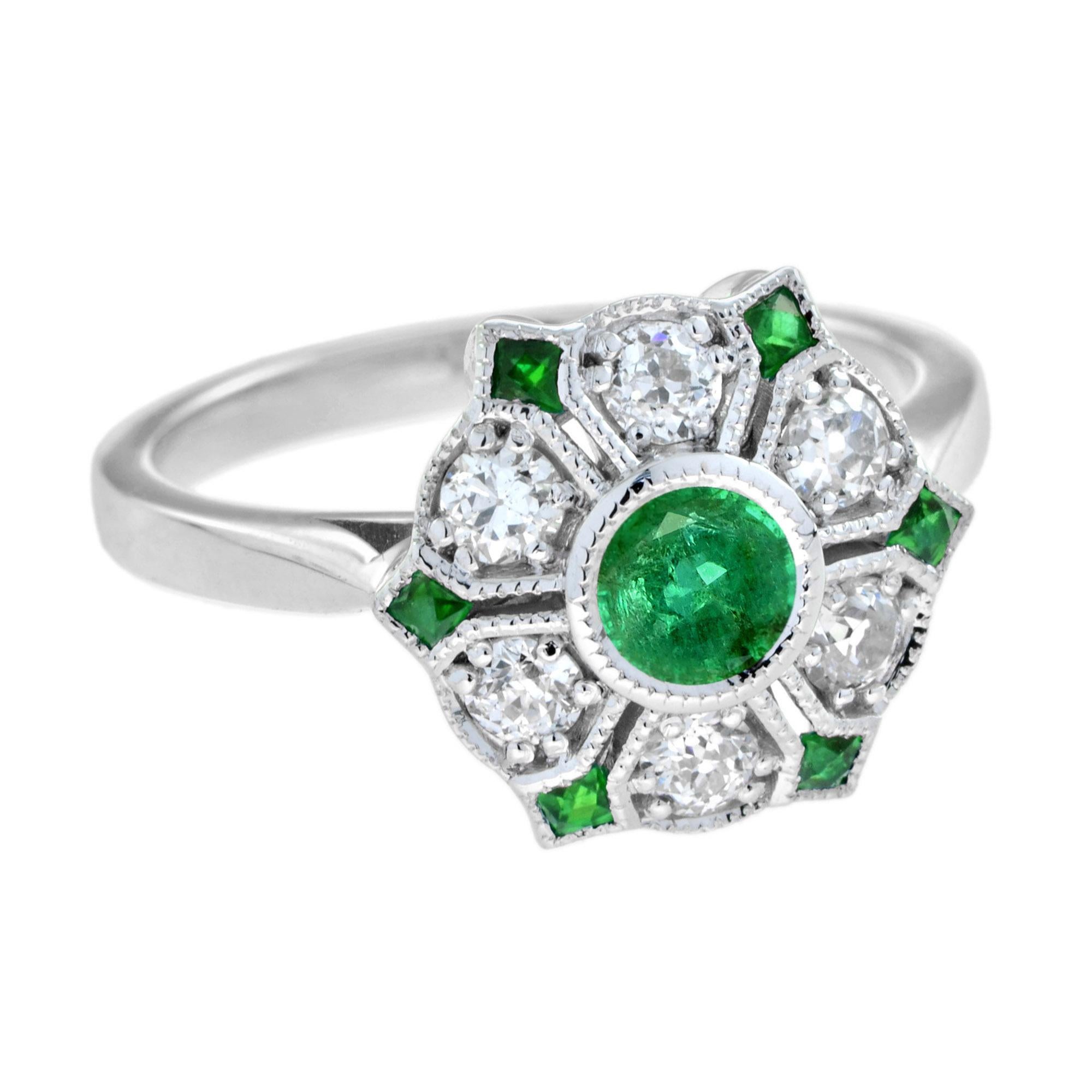 A lovely floral ring for anyone who loves antique-inspired jewelry. Made of round cut emerald and dazzling diamond set on 18k white top gold. A center emerald form a flower with diamond and French cut emeralds petals design for a beautifully