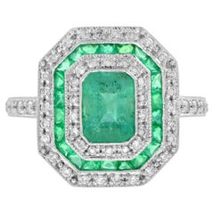 Bague de fiançailles en or avec double halo de style Art Deco, émeraude verte et diamant